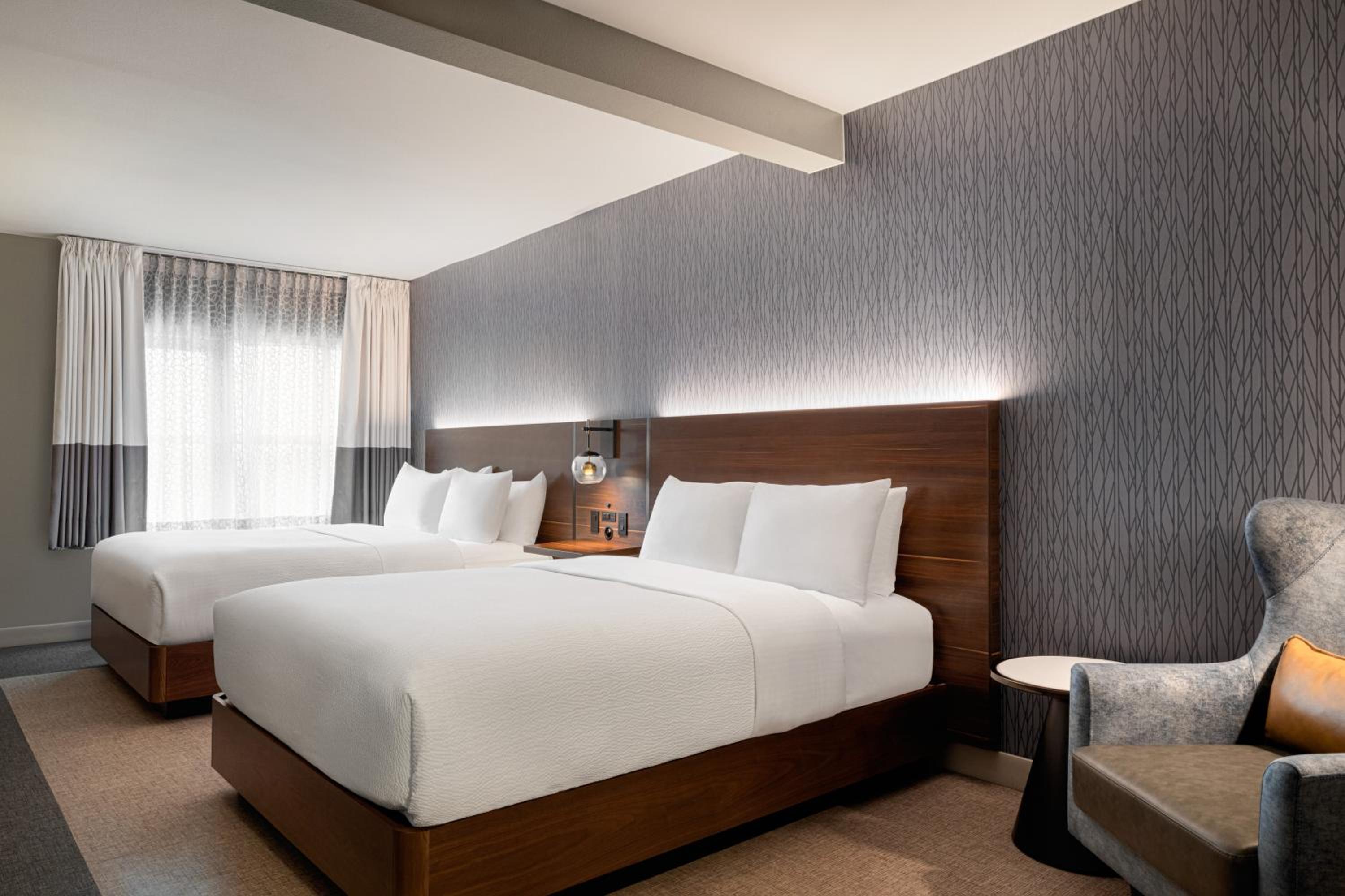 Guest Room with Two Queen Beds - Photo 9
