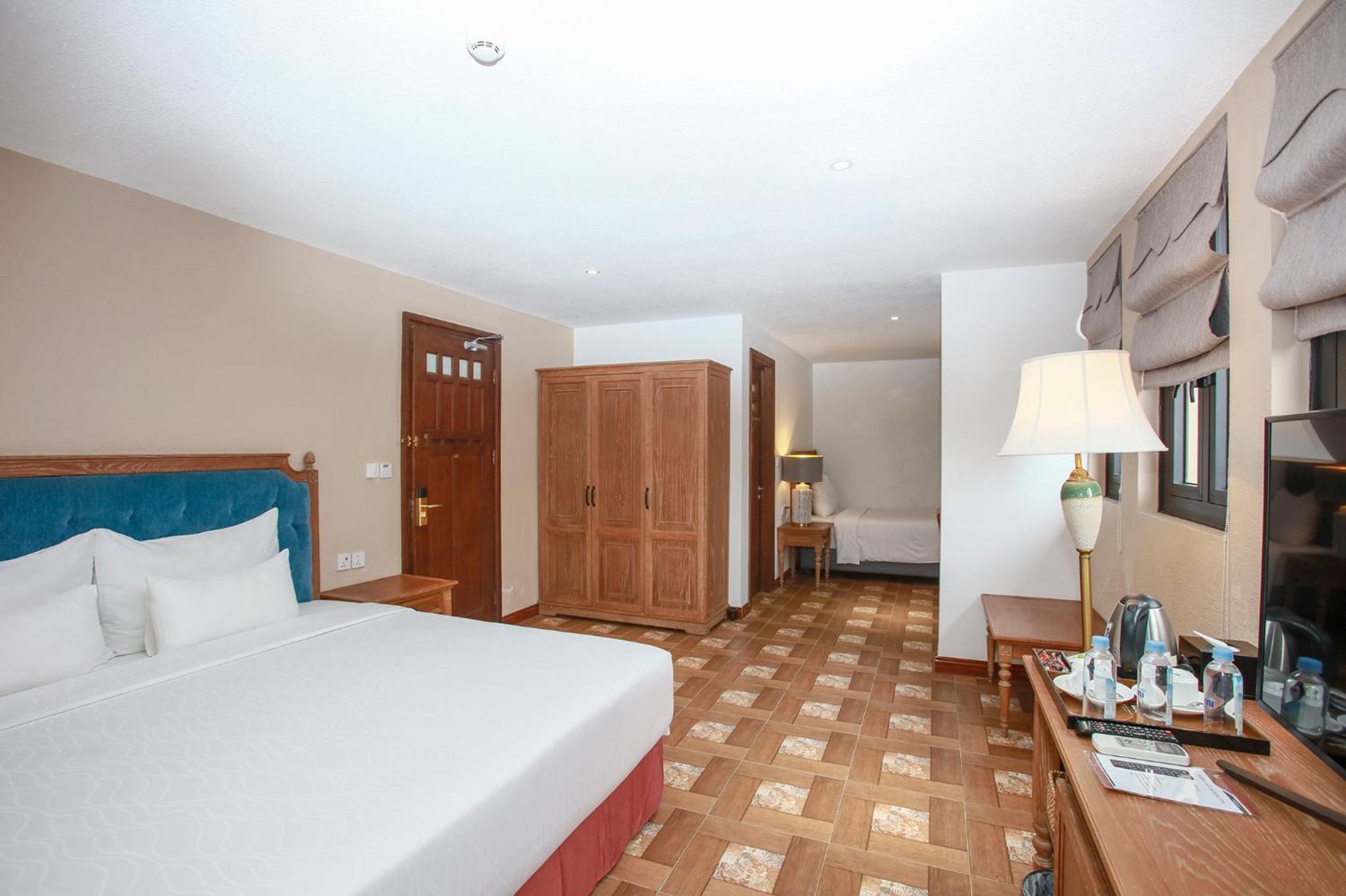 Deluxe Triple Room - Photo 10