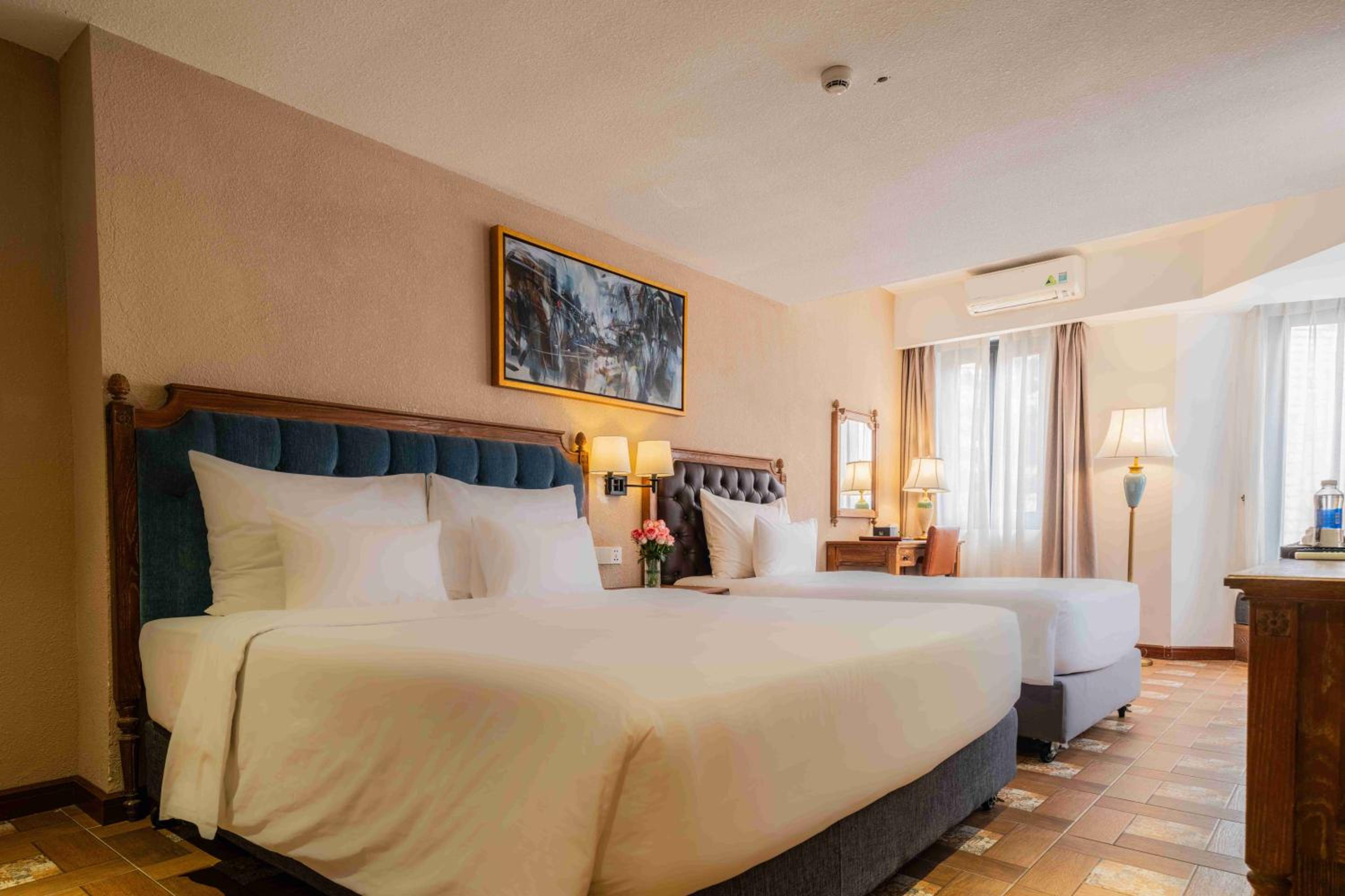 Deluxe Triple Room - Photo 8