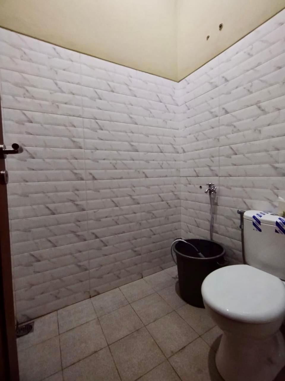 Three-Bedroom House - Photo 13
