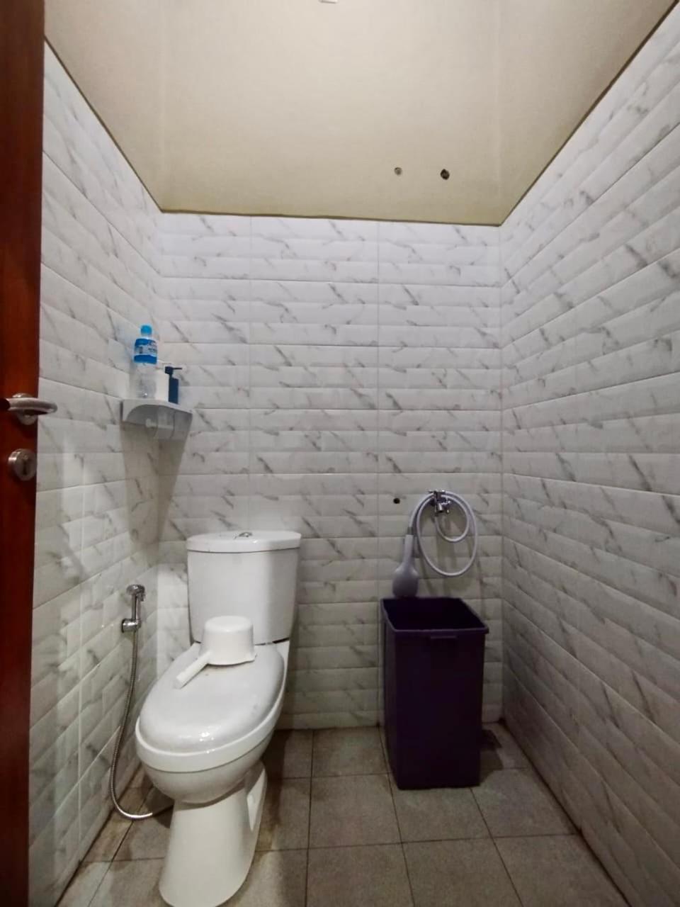Three-Bedroom House - Photo 15