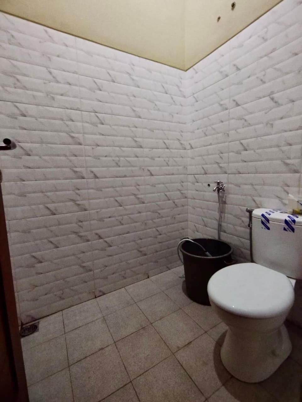 Three-Bedroom House - Photo 16