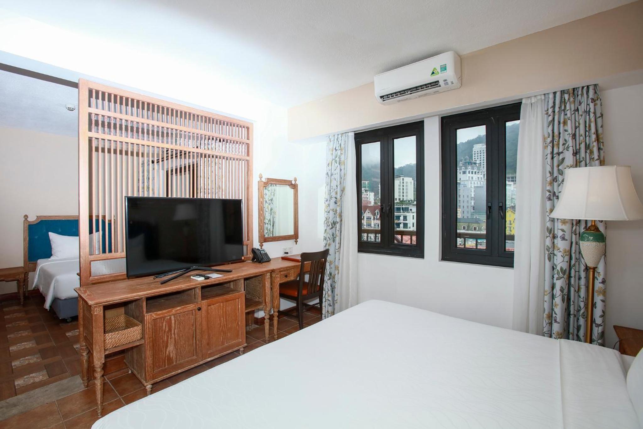 Deluxe Triple Room - Photo 9