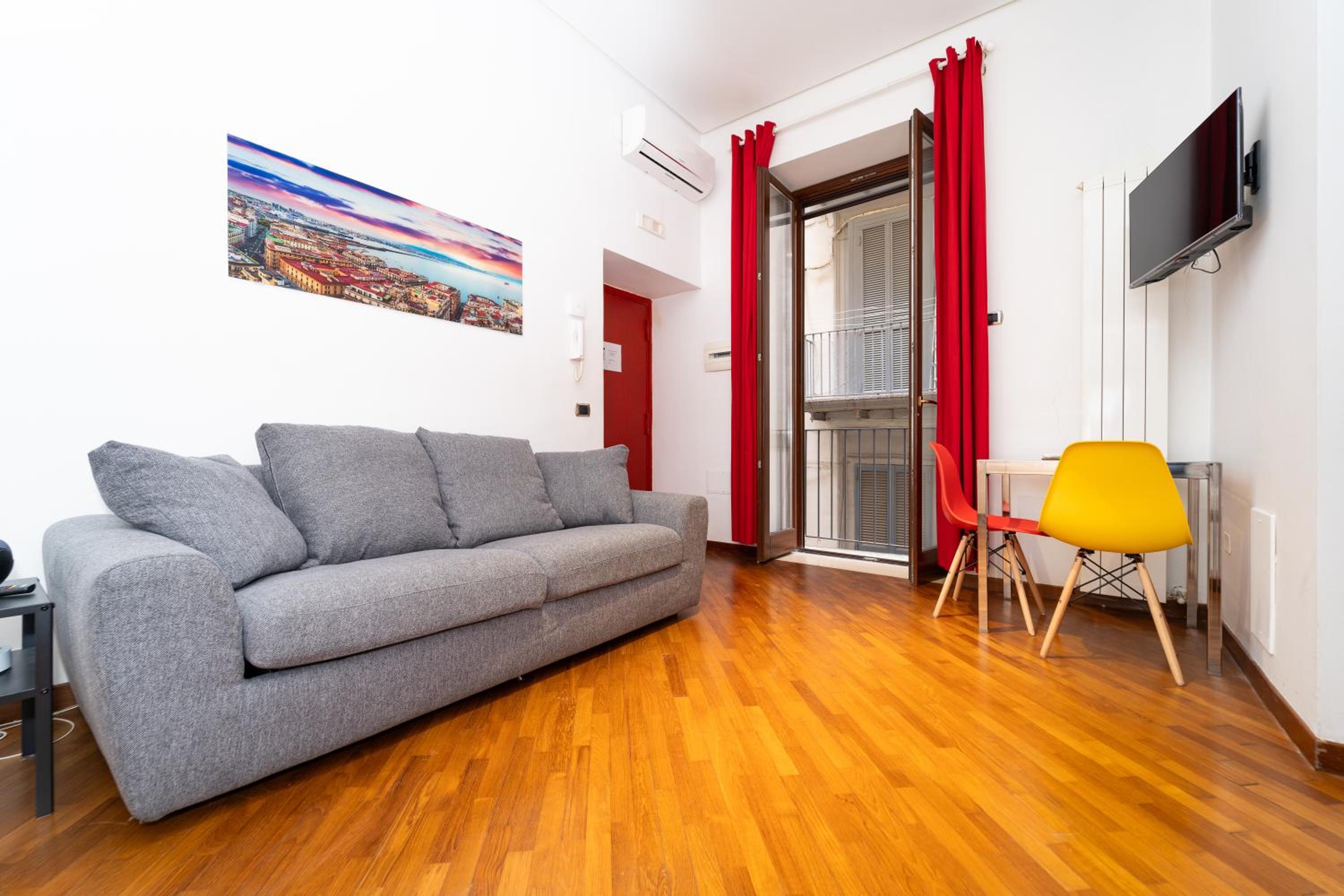 One-Bedroom Apartment with Balcony and City View