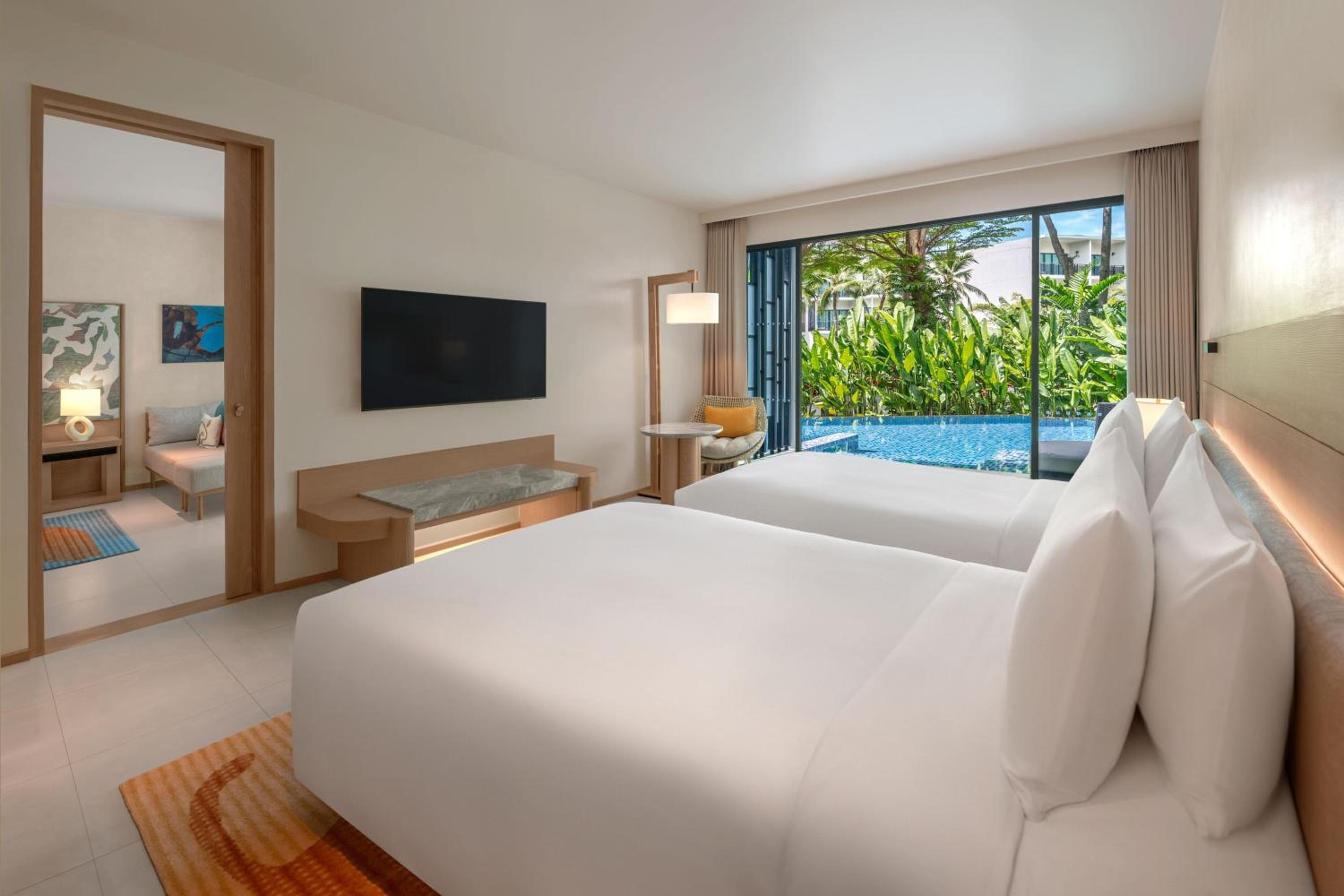 Two-Bedroom Suite with One King Bed and Two Double Beds - Photo 3
