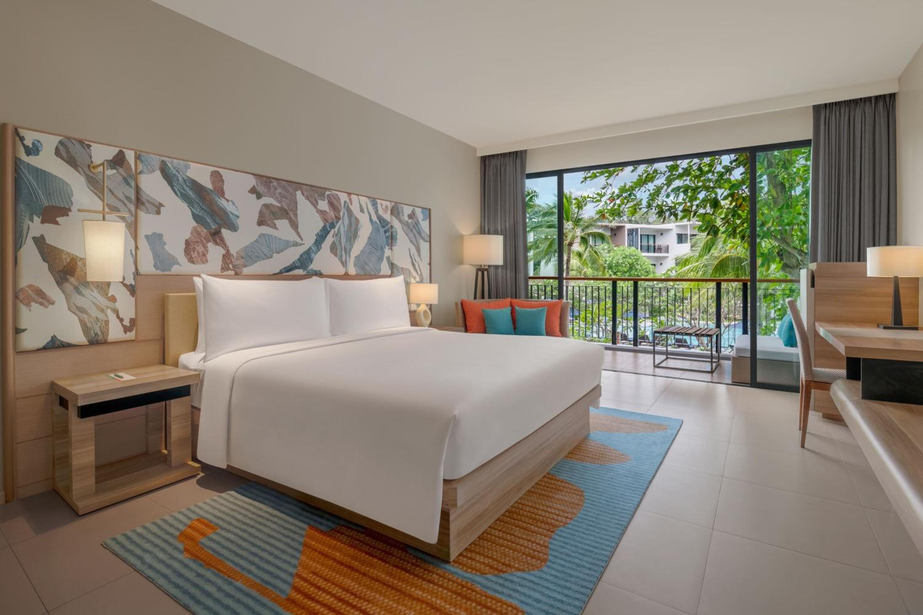 Deluxe King Room with Balcony and Pool View - Photo 1