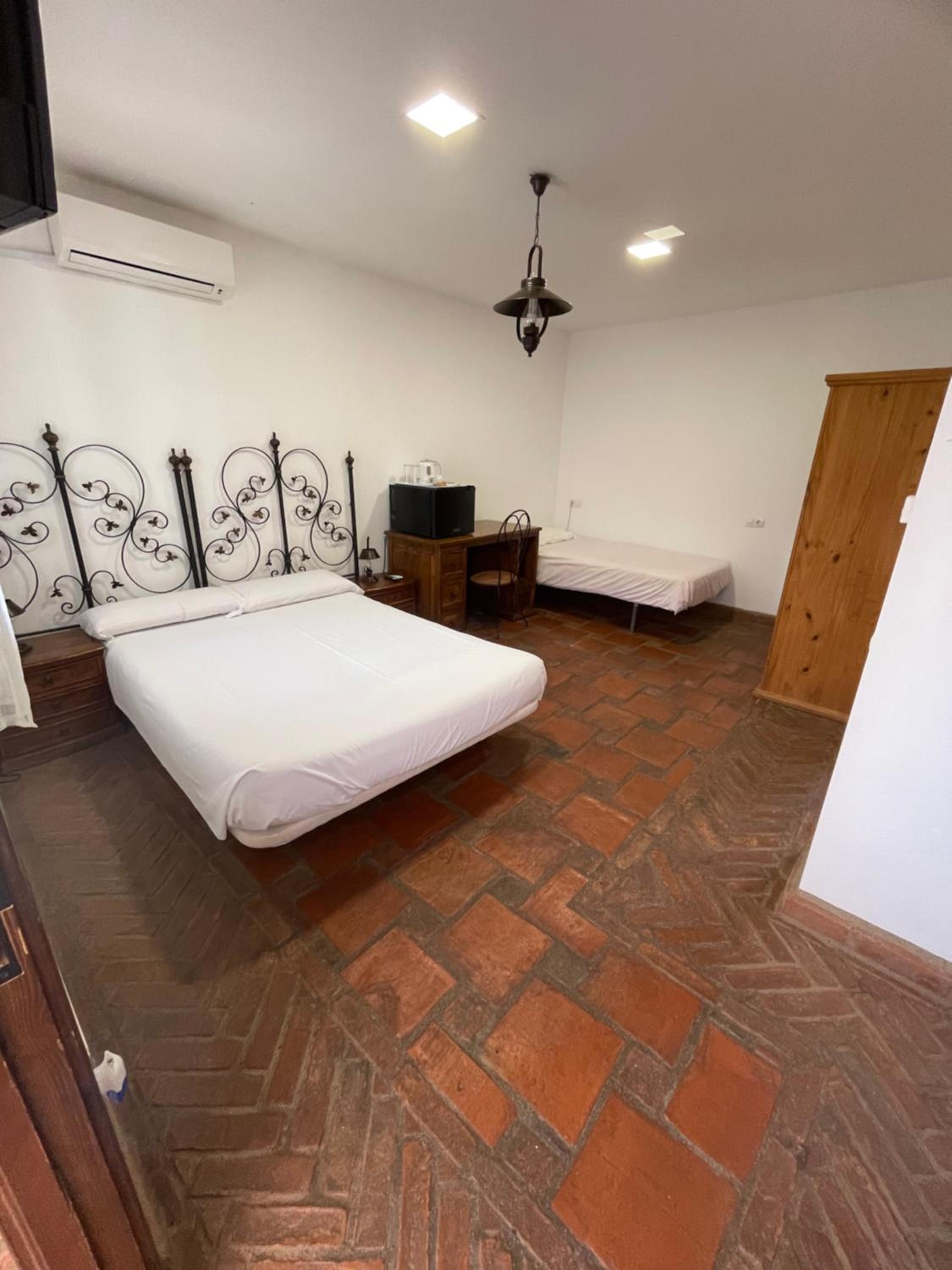 Habitación Deluxe (2 Adultos + 1 Niño)