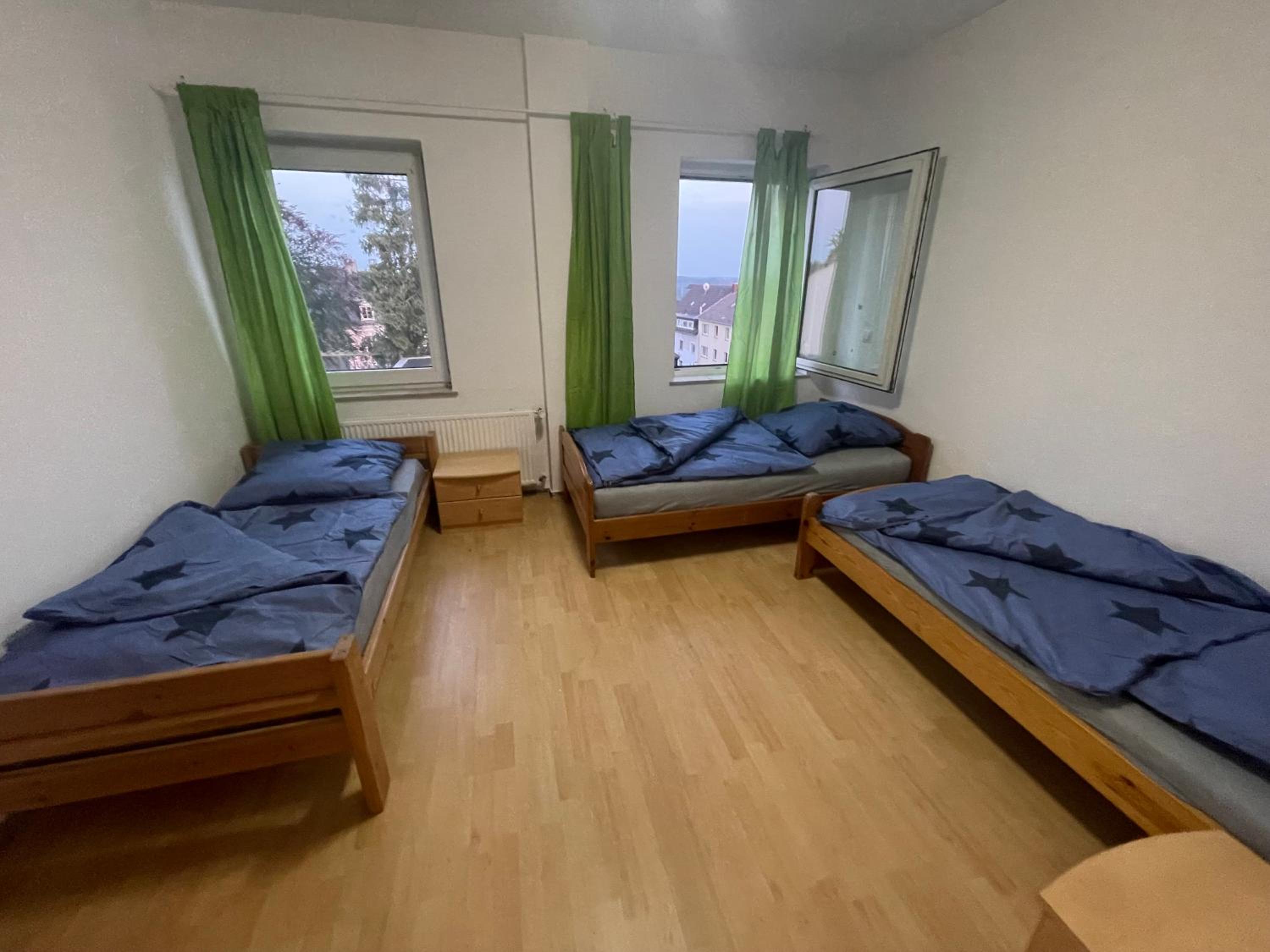 Three-Bedroom Apartment photo 1