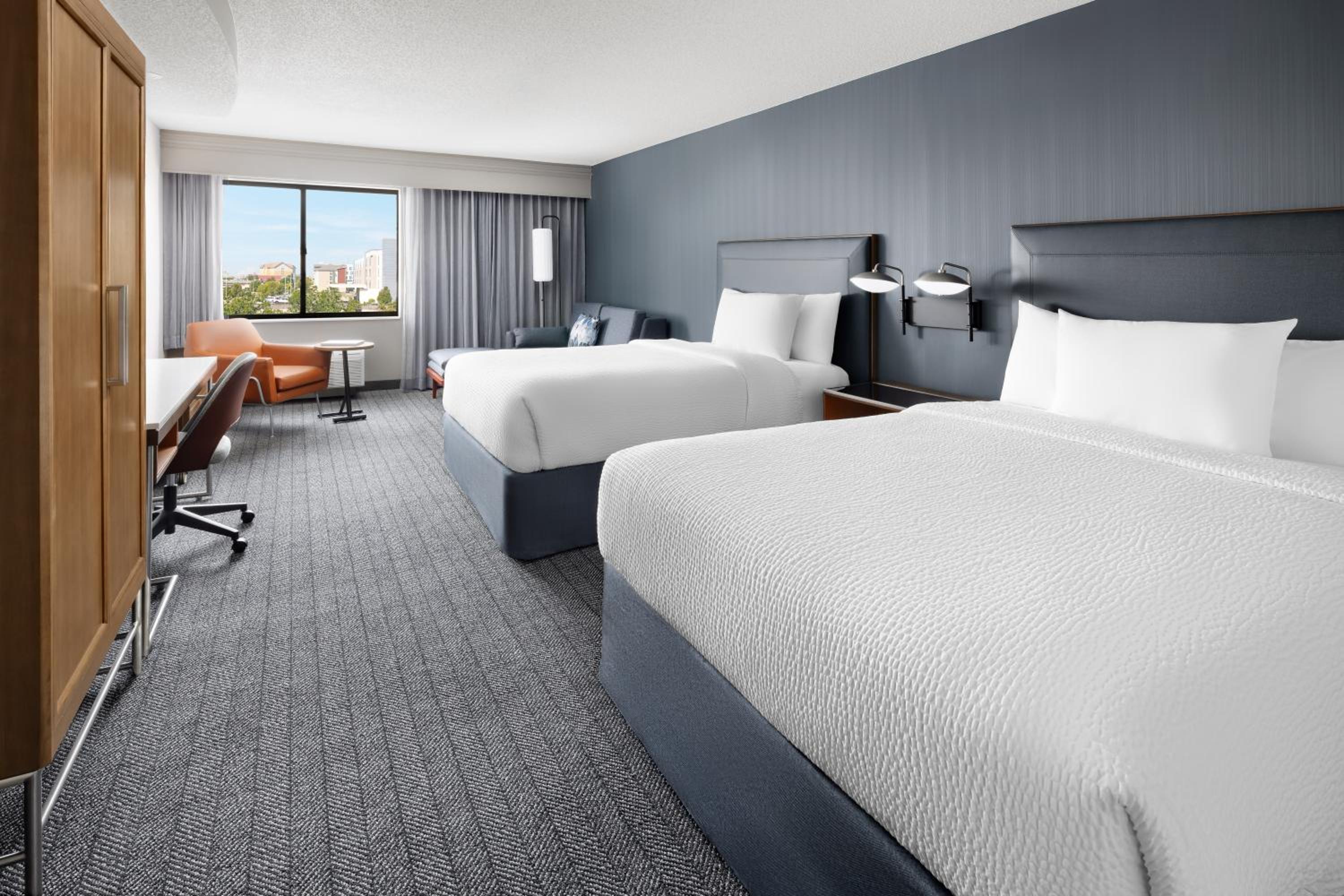 Large Queen Room with Two Queen Beds and Sofa Bed - Photo 1