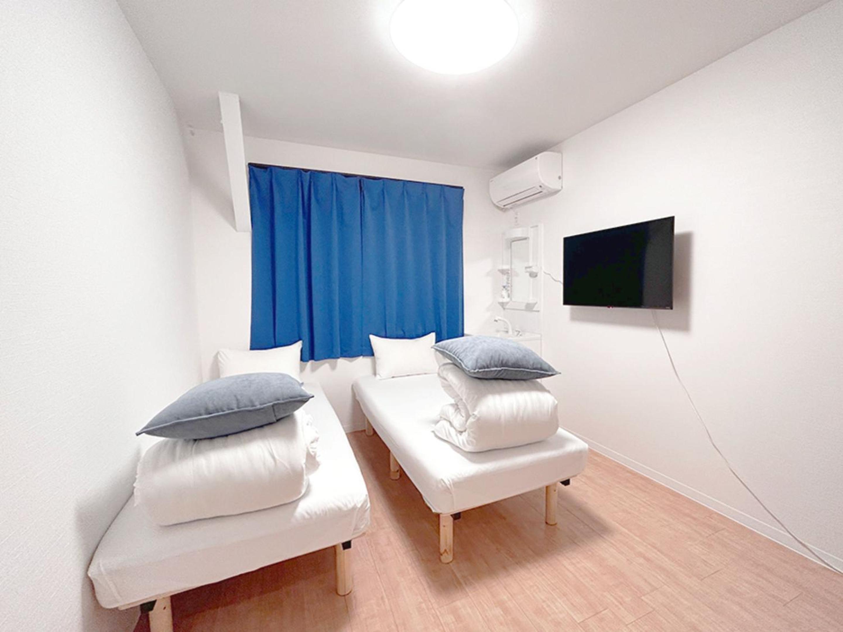 Twin Room With Shared Bathroom