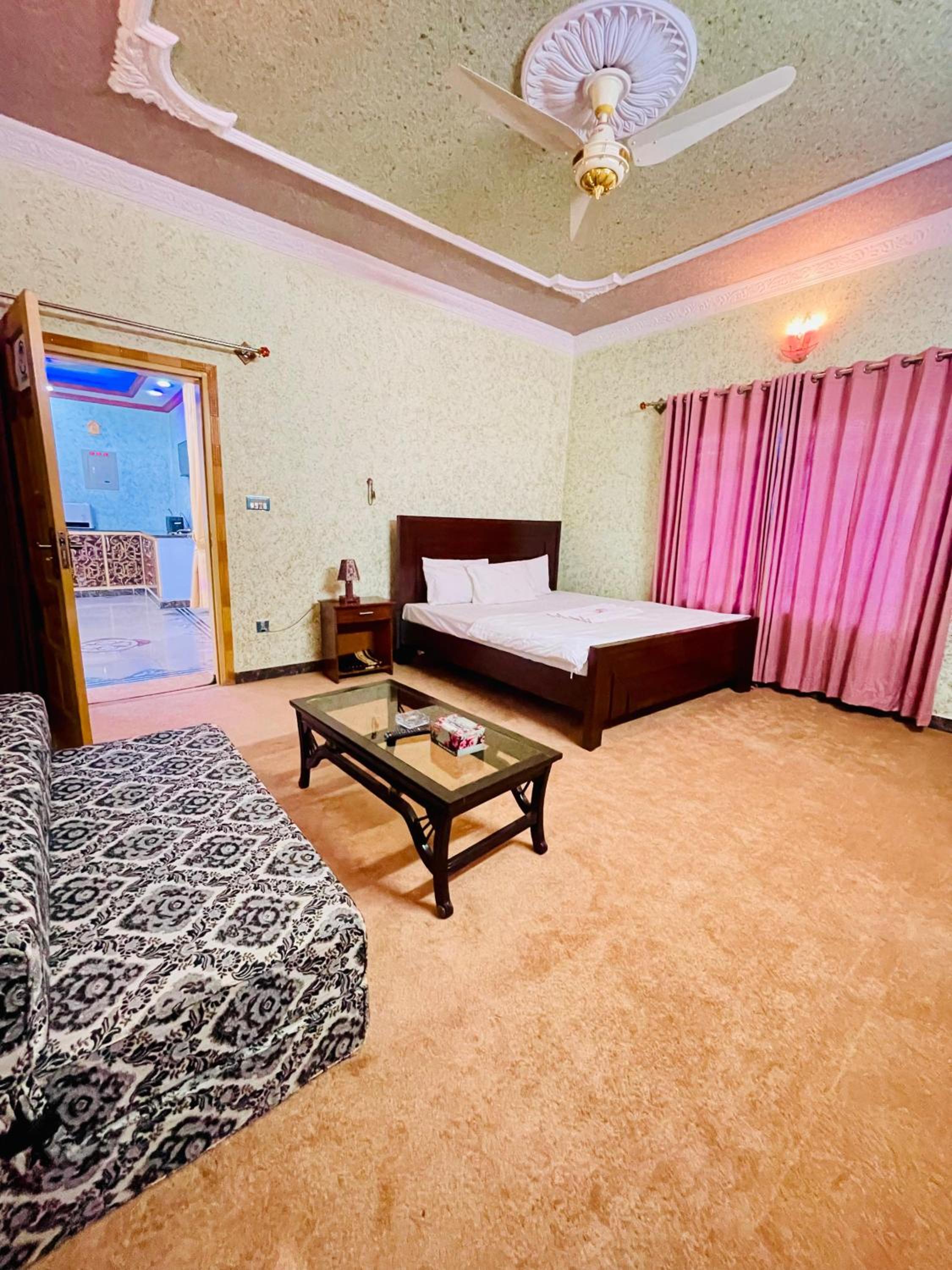 Deluxe Queen Room with Two Queen Beds photo 1
