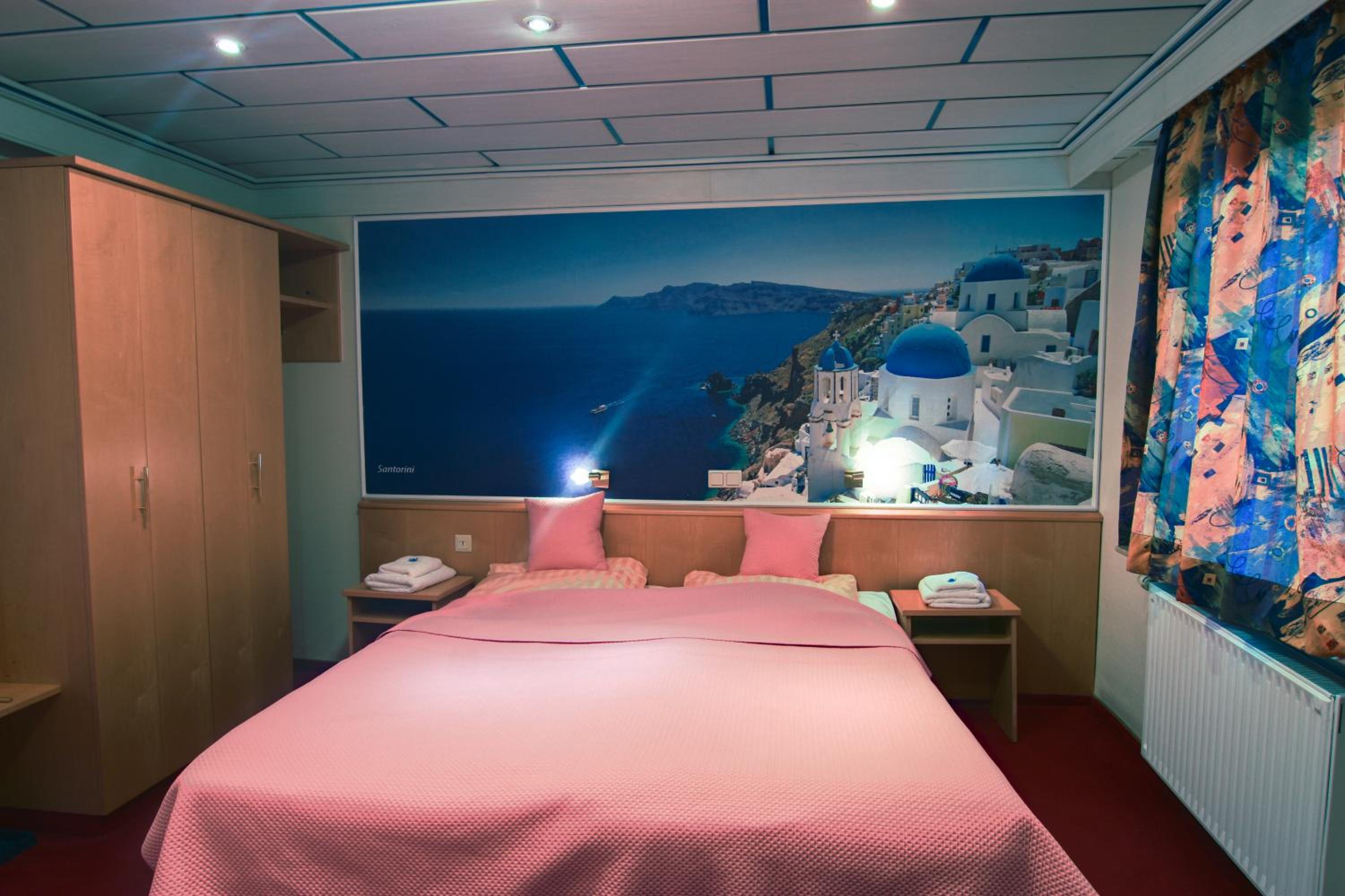 Quadruple Room with Balcony - Photo 1