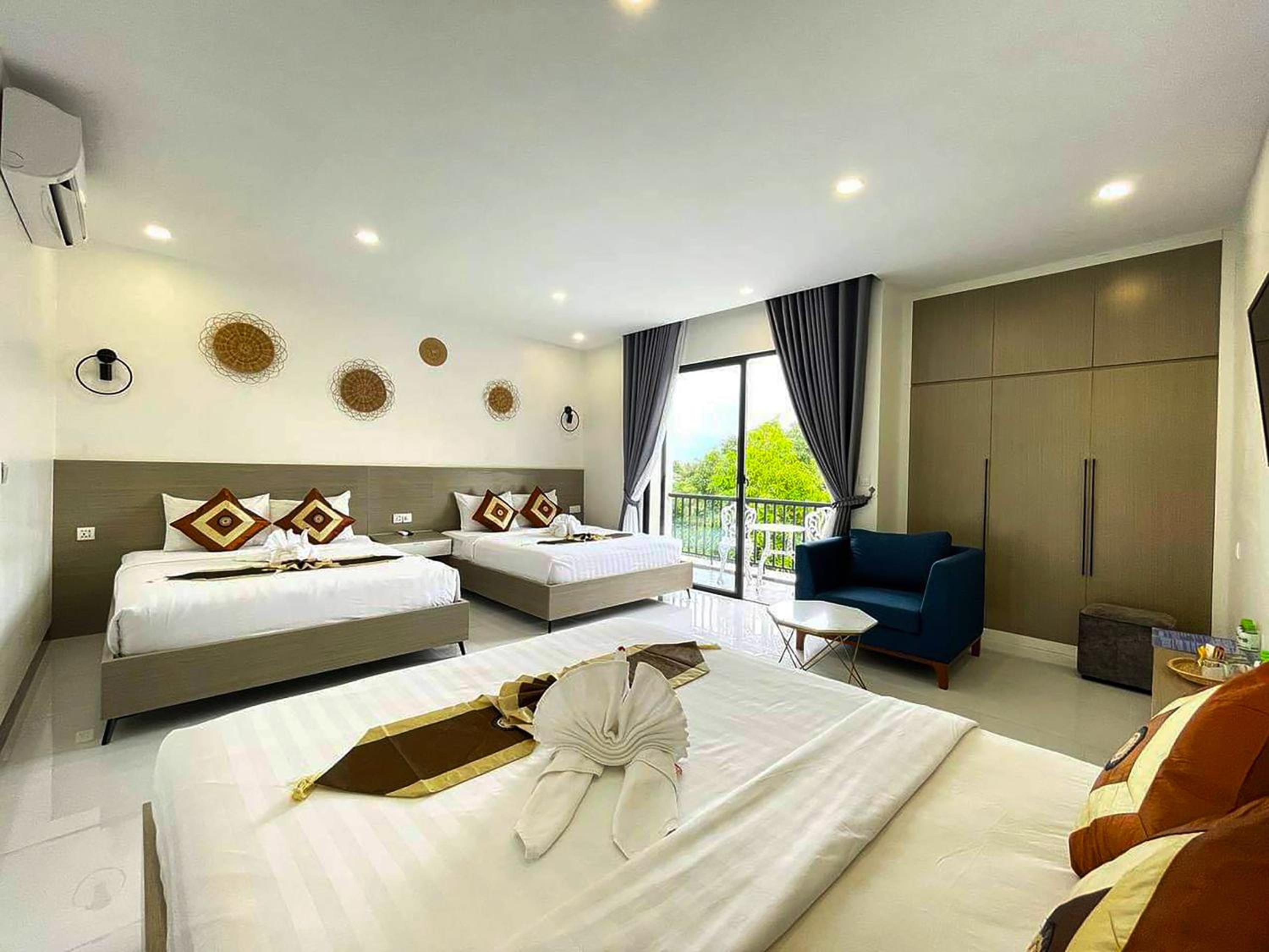 Deluxe Triple Room - Photo 1