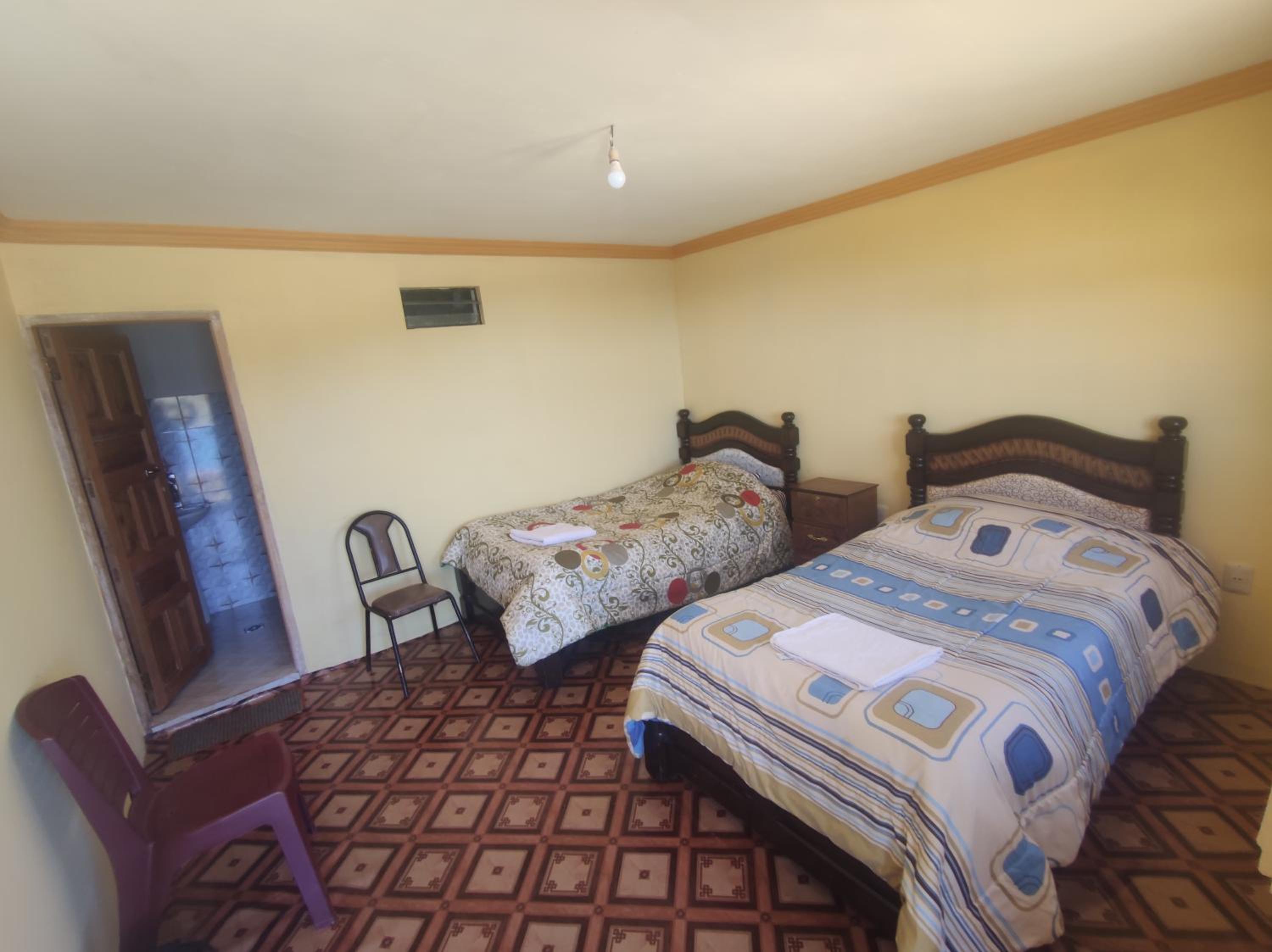 Deluxe Queen Room with Two Queen Beds photo 1