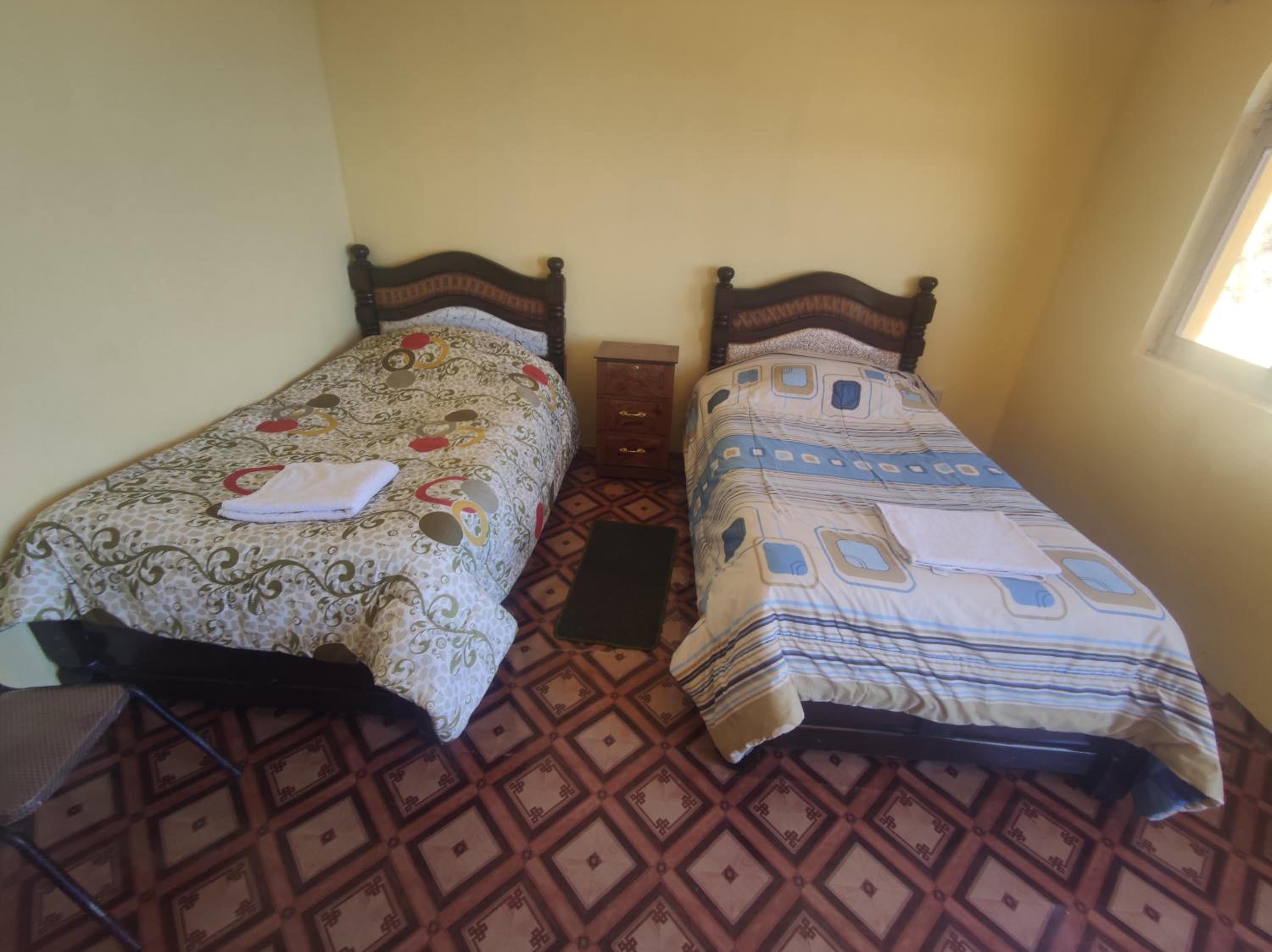 Deluxe Queen Room with Two Queen Beds photo 2