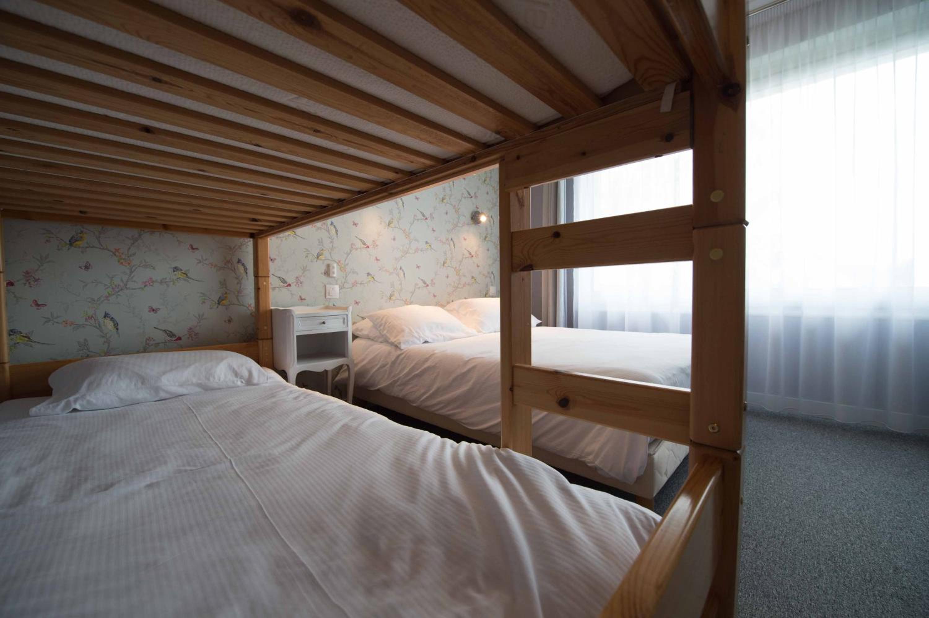 Quadruple Room (2 Adults + 2 Children) photo 3