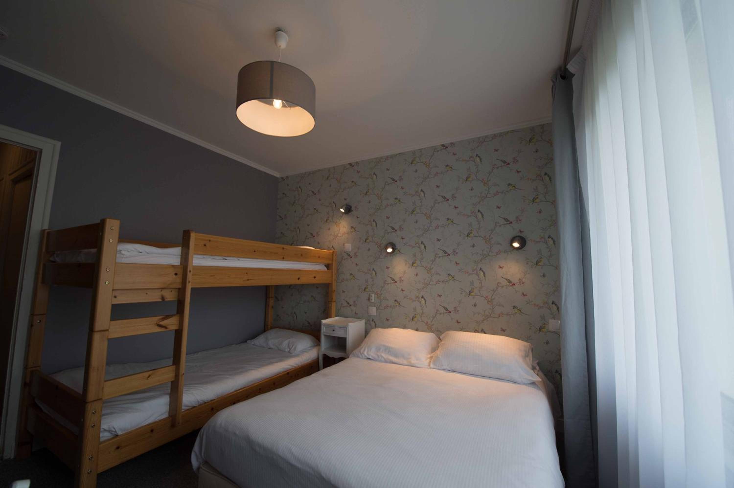 Quadruple Room (2 Adults + 2 Children)