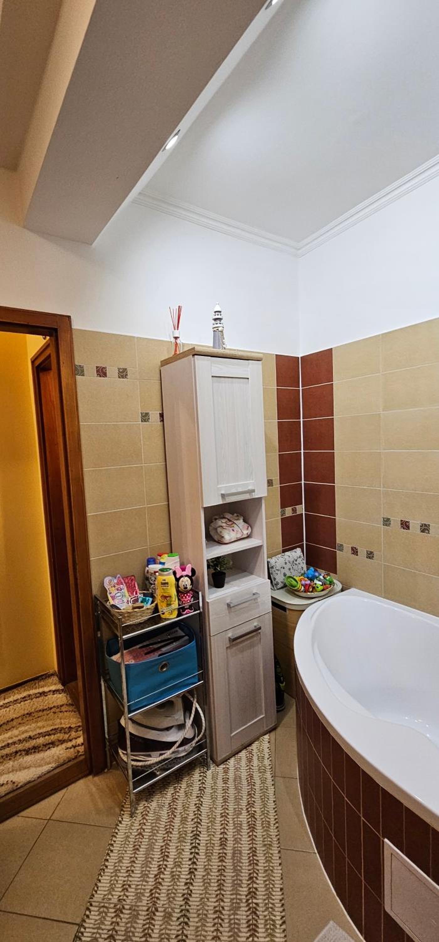 Three-Bedroom Apartment - Photo 10