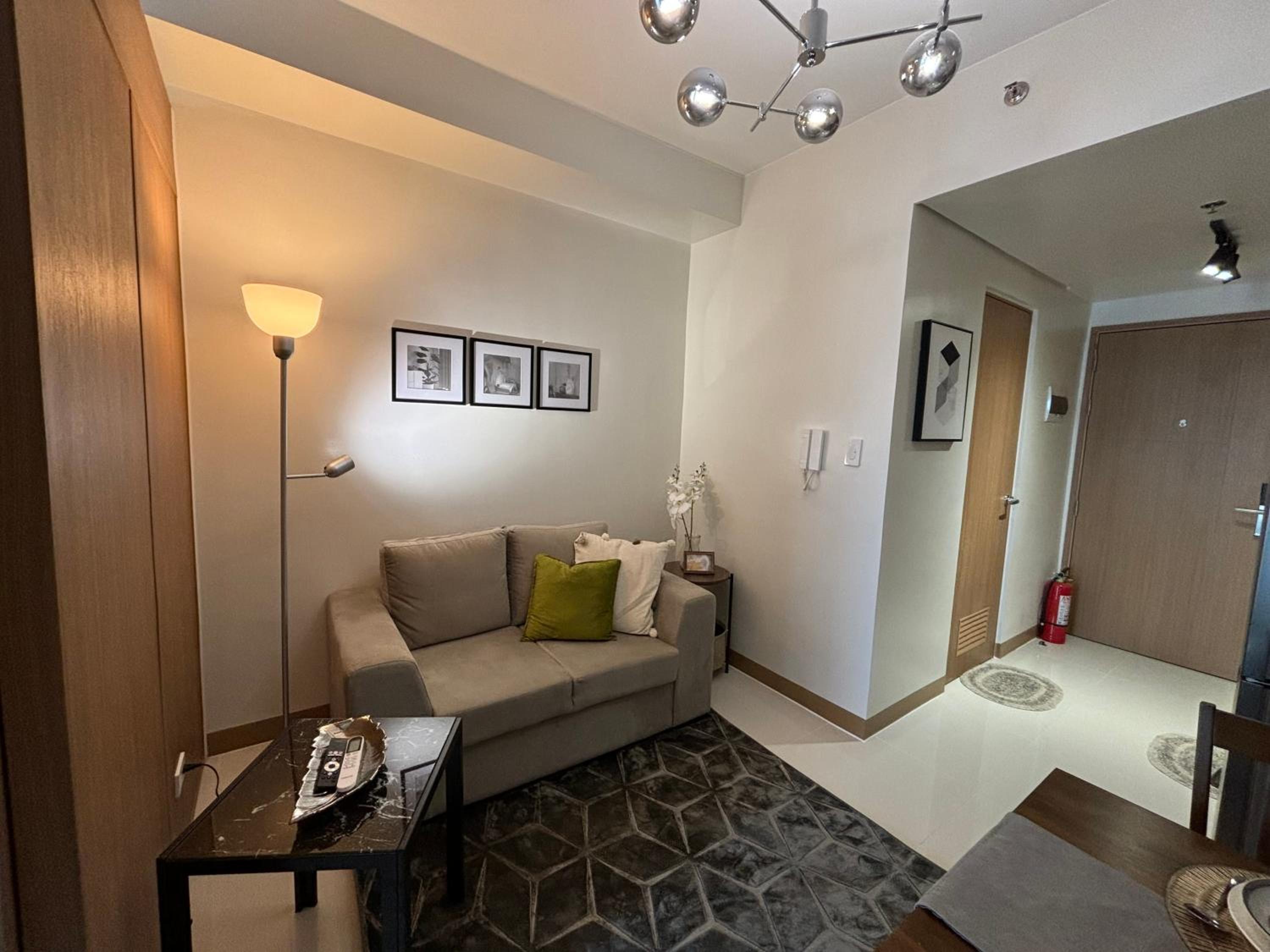 One-Bedroom Apartment with Balcony and City View
