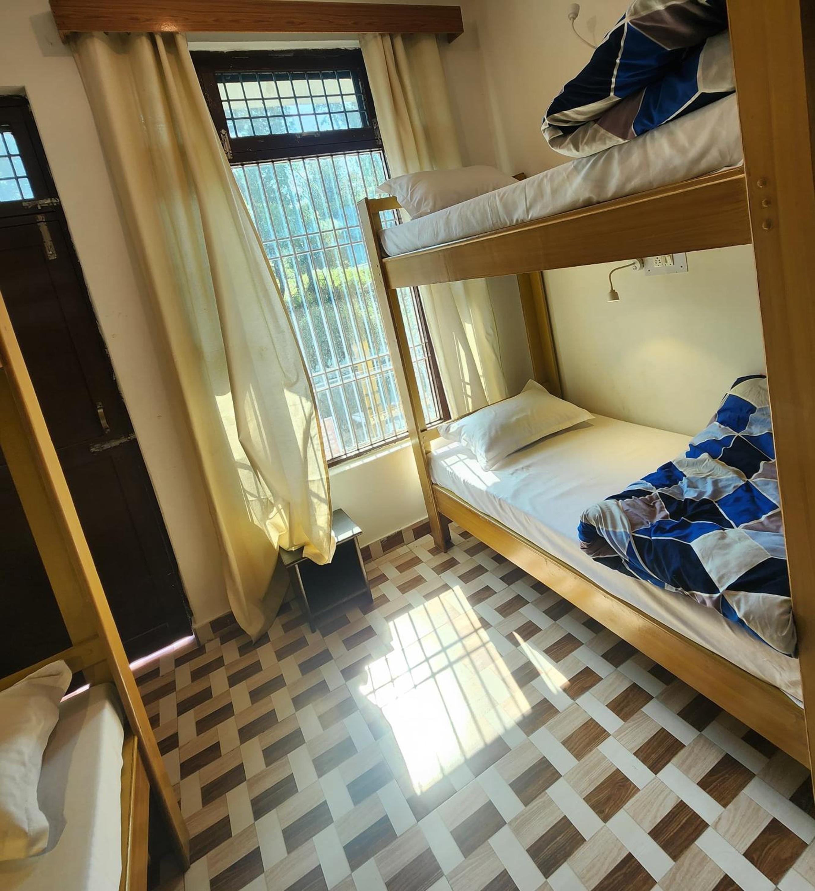 Single Bed In Dormitory Room photo 1