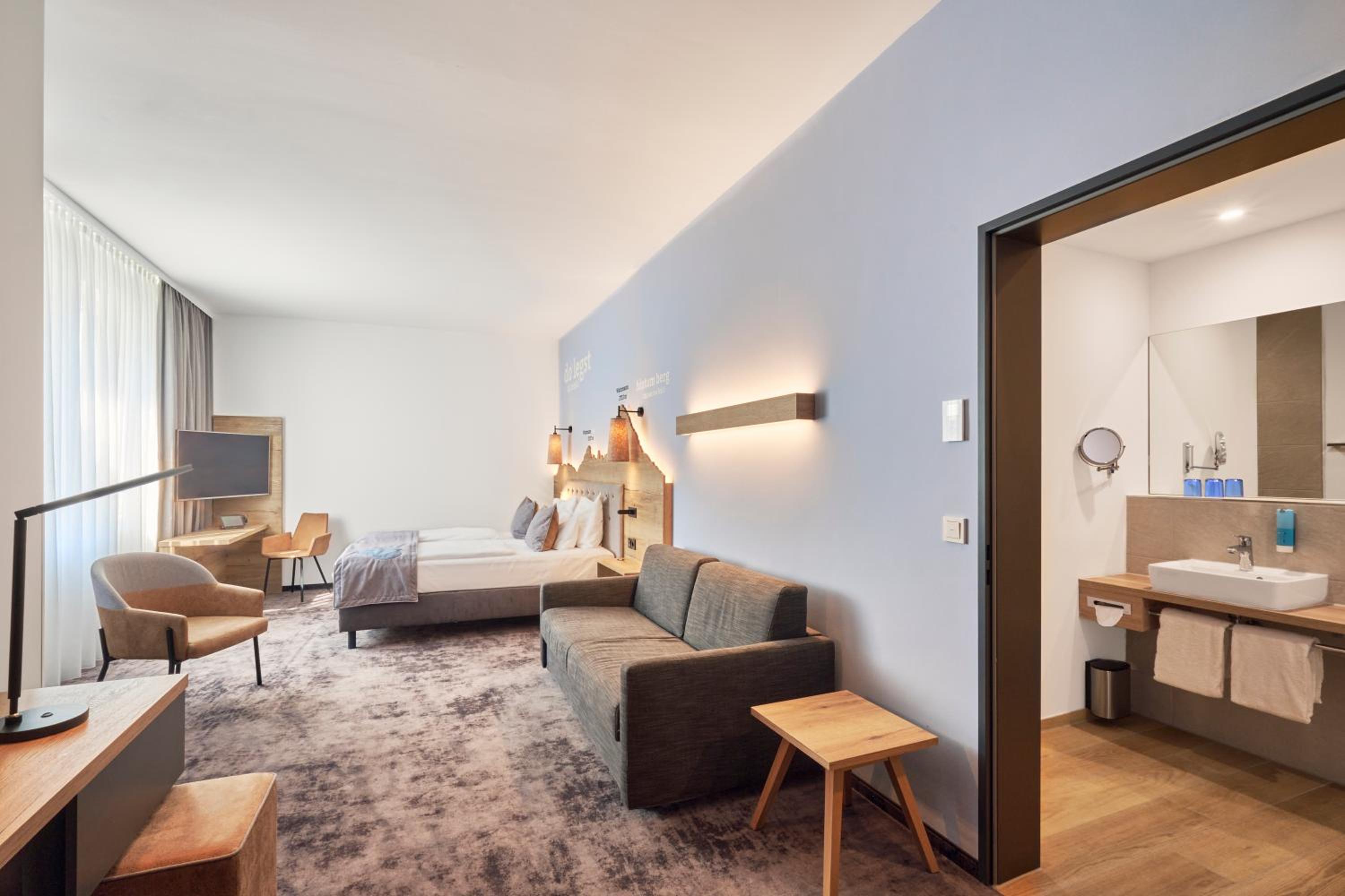 Junior Suite with Walk-In Shower and Sofa Bed