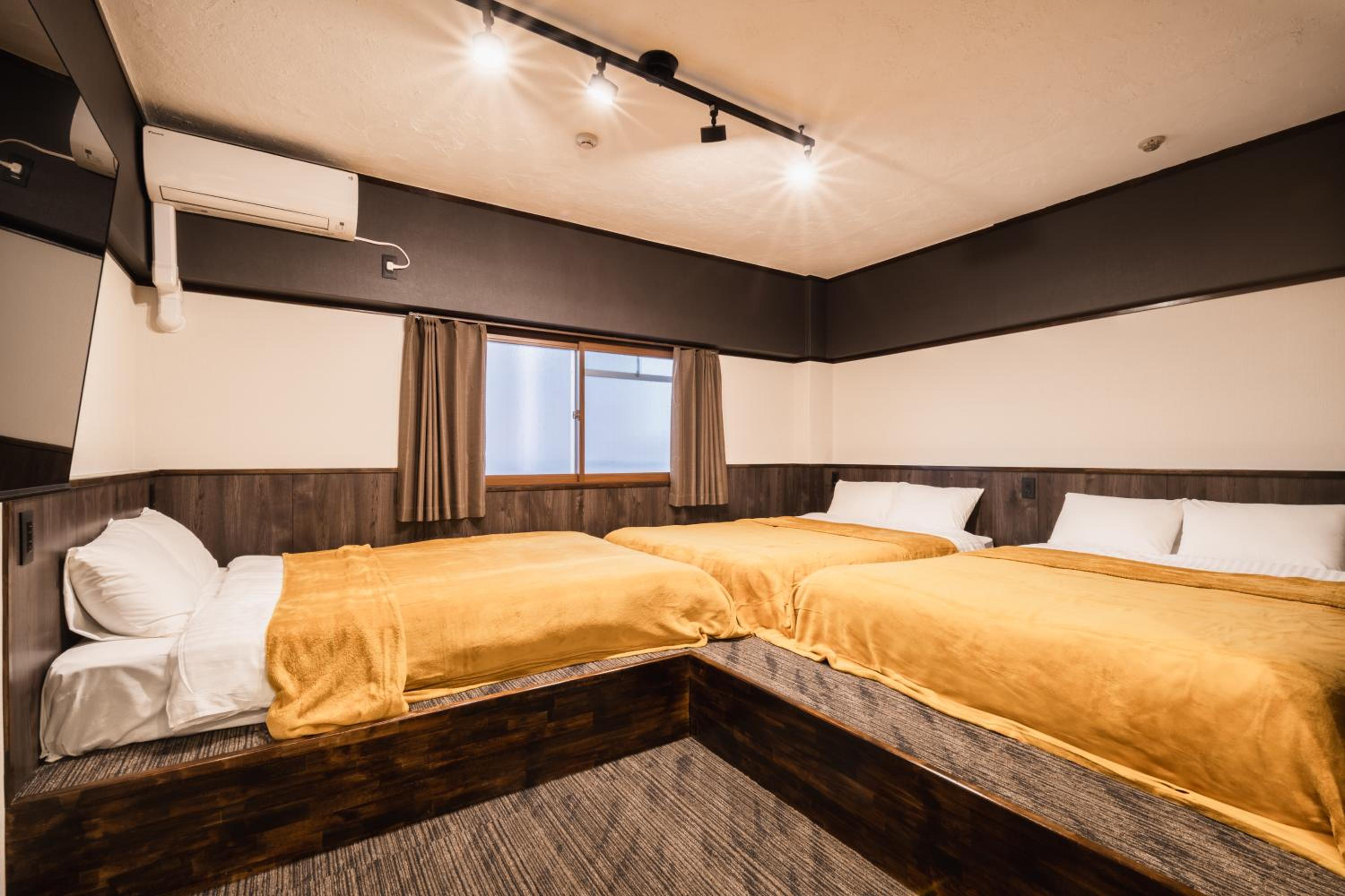 Deluxe Triple Room - Photo 11