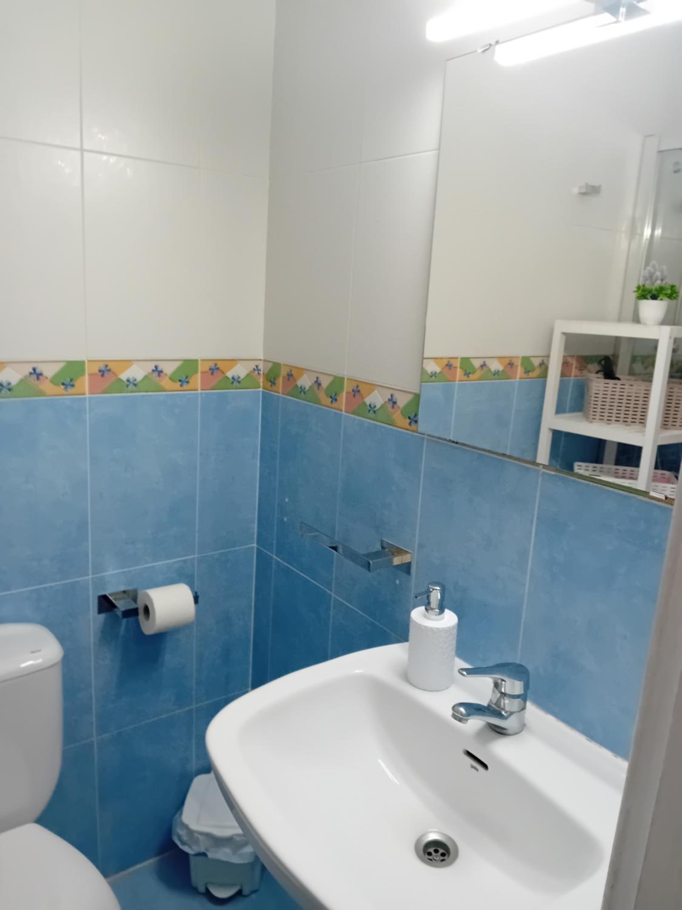 Three-Bedroom Apartment with Balcony photo 3