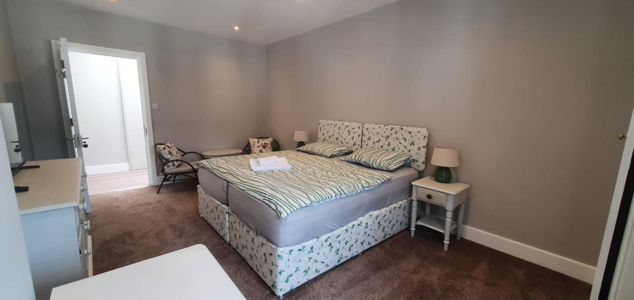 Three-Bedroom Apartment photo 1