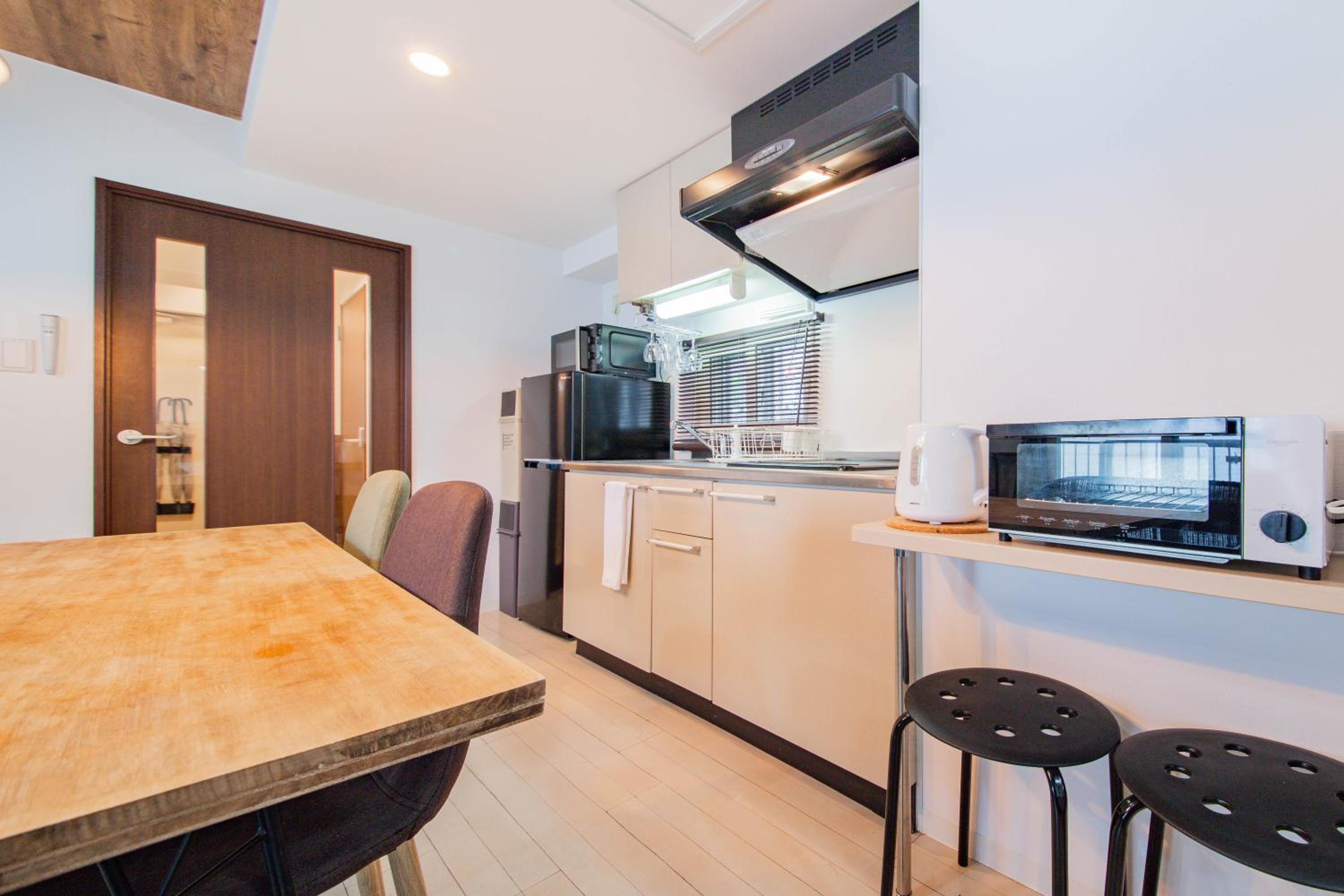 Two-Bedroom Apartment - Photo 33