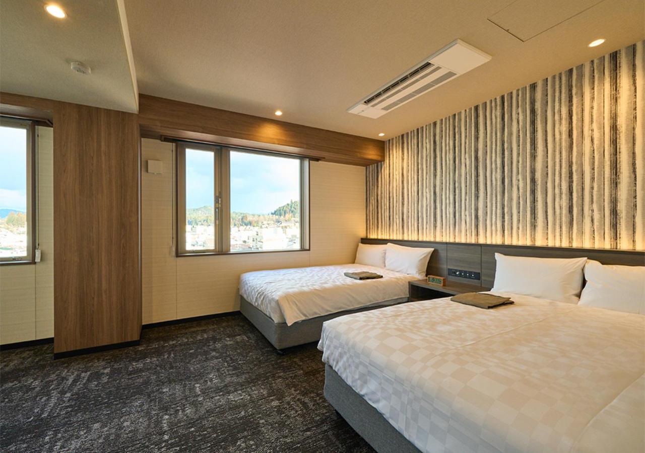Universal Twin Room - Photo 2