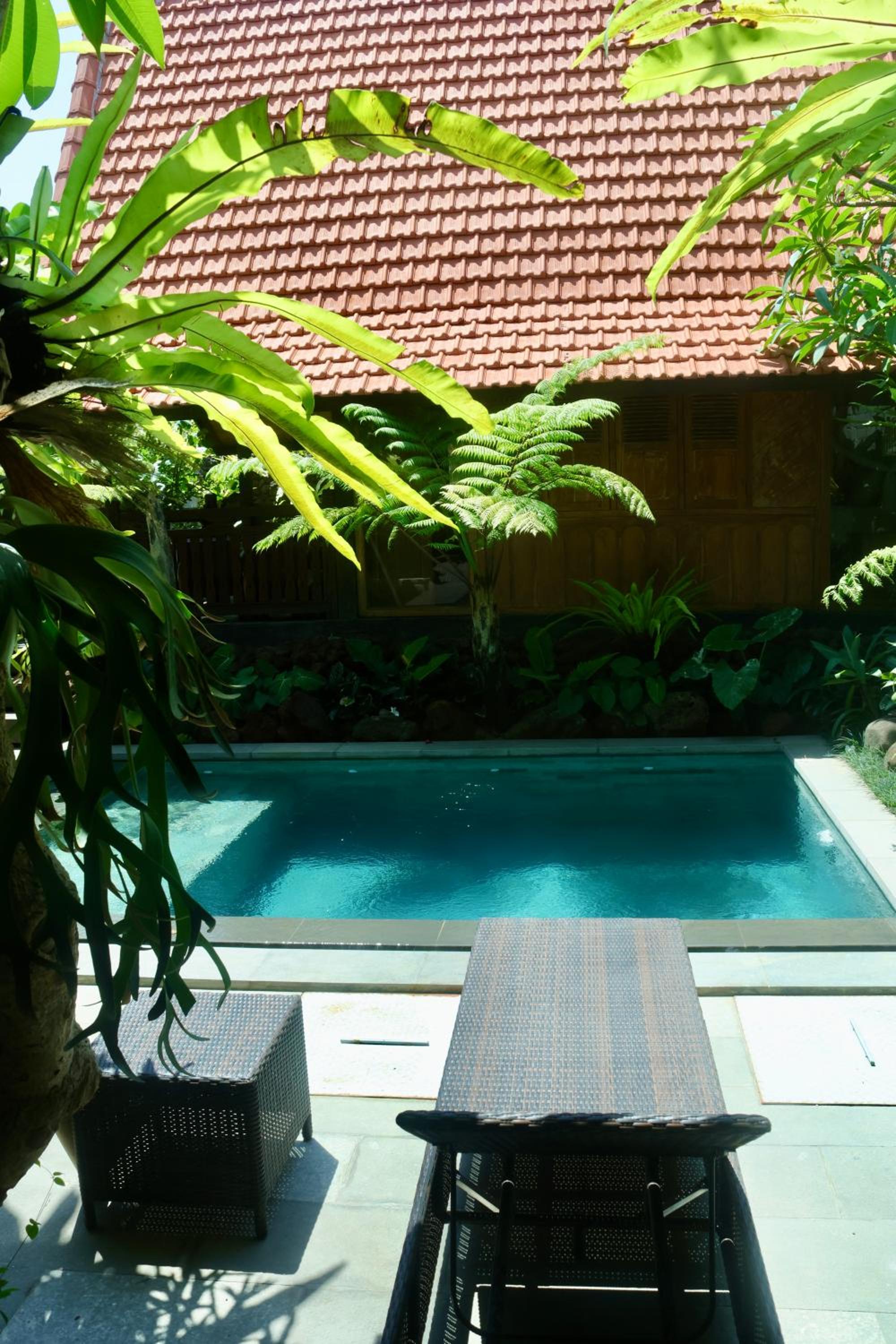 Deluxe Double Room (2 Adults + 1 Child) - Photo 9