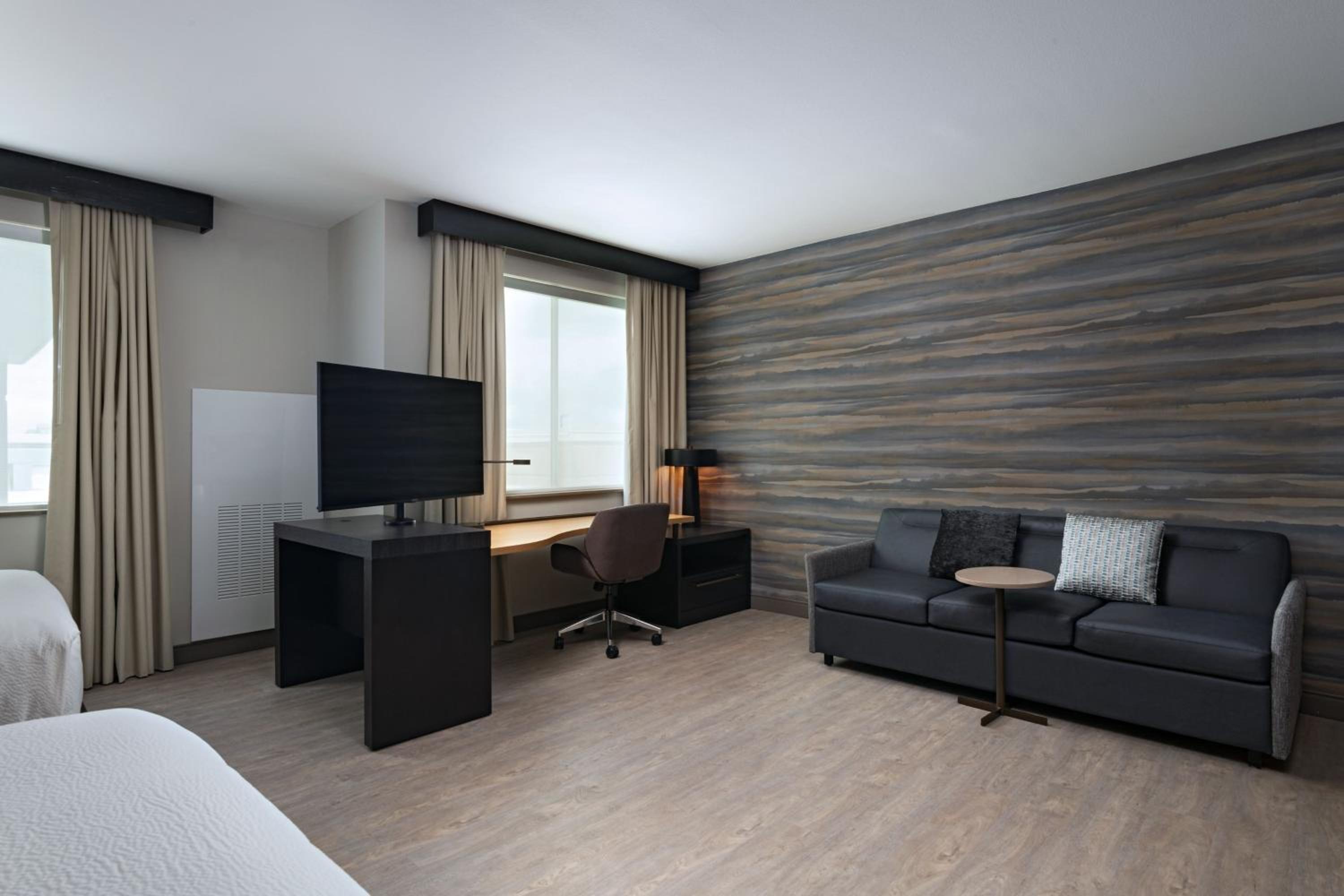 Queen Studio with Two Queen Beds and Sofa Bed - Photo 1