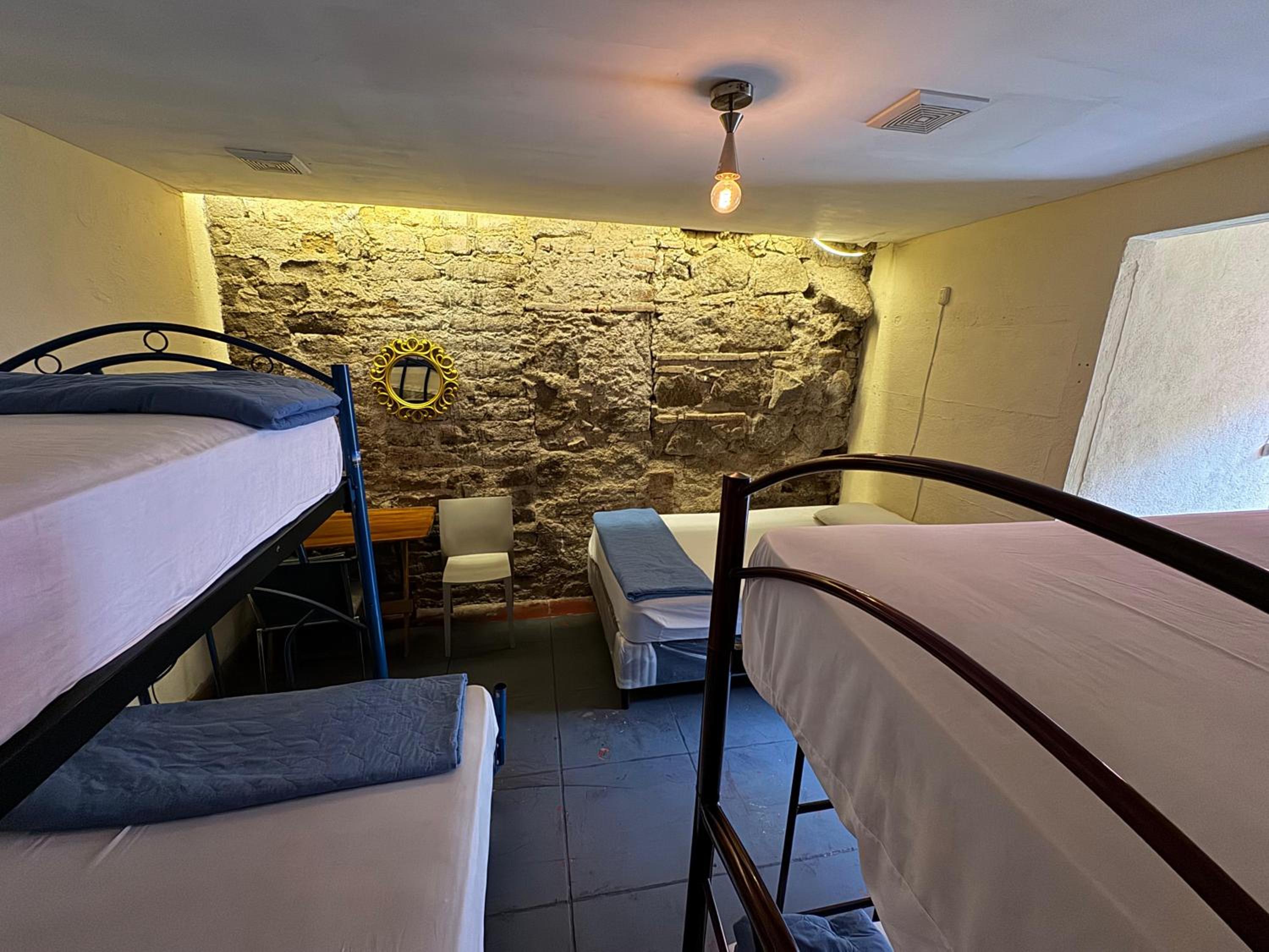 Single Bed In Male Dormitory Room With Shared Bathroom photo 1