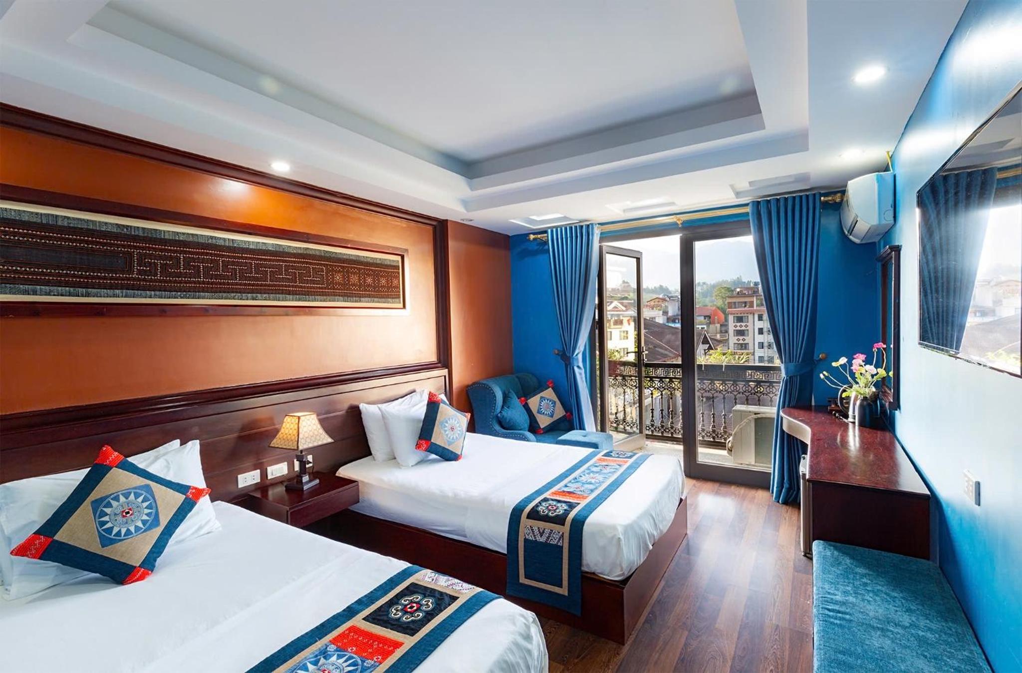 Deluxe Queen Room with Two Queen Beds photo 1
