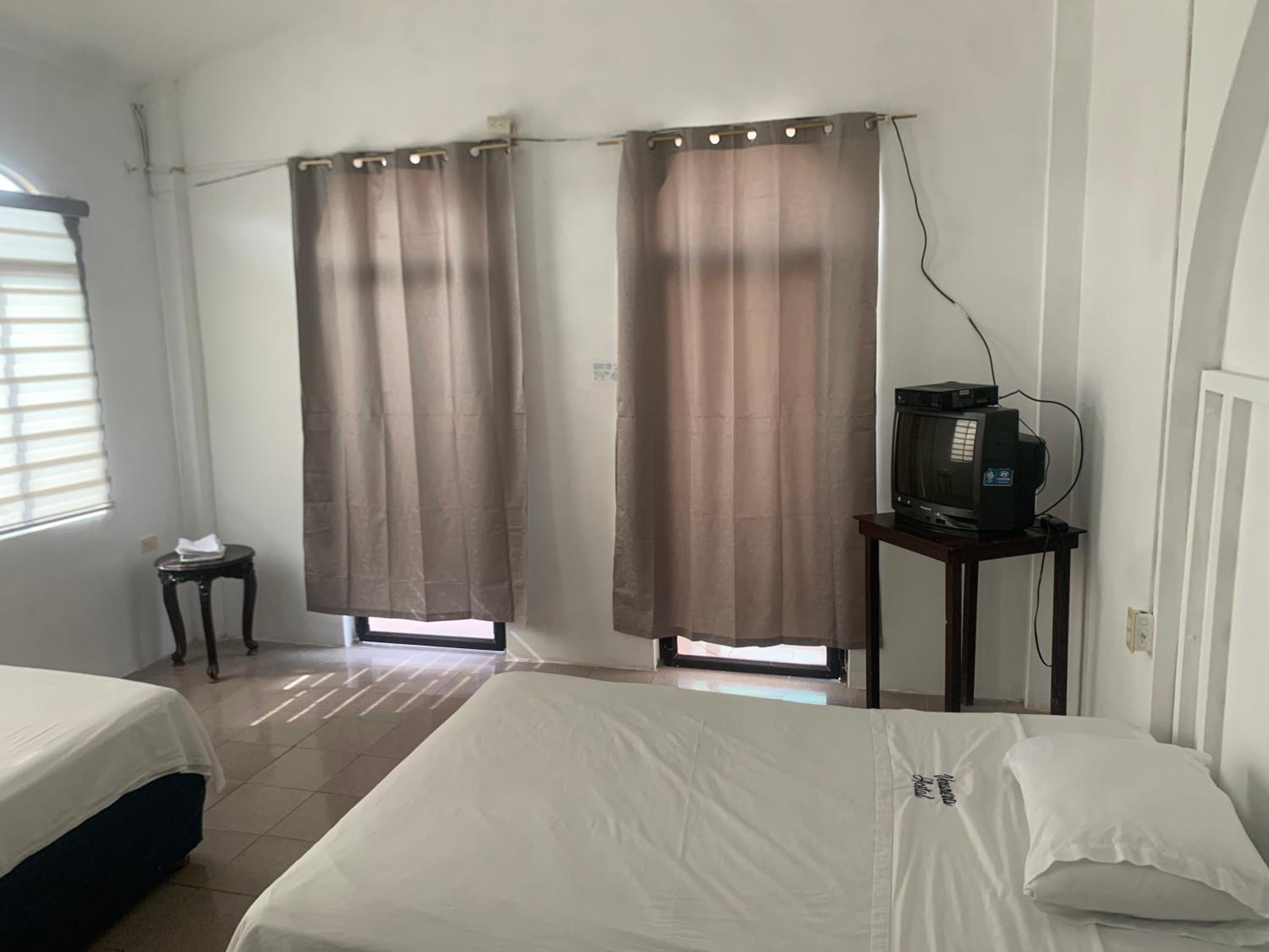 Quadruple Room with Balcony photo 3
