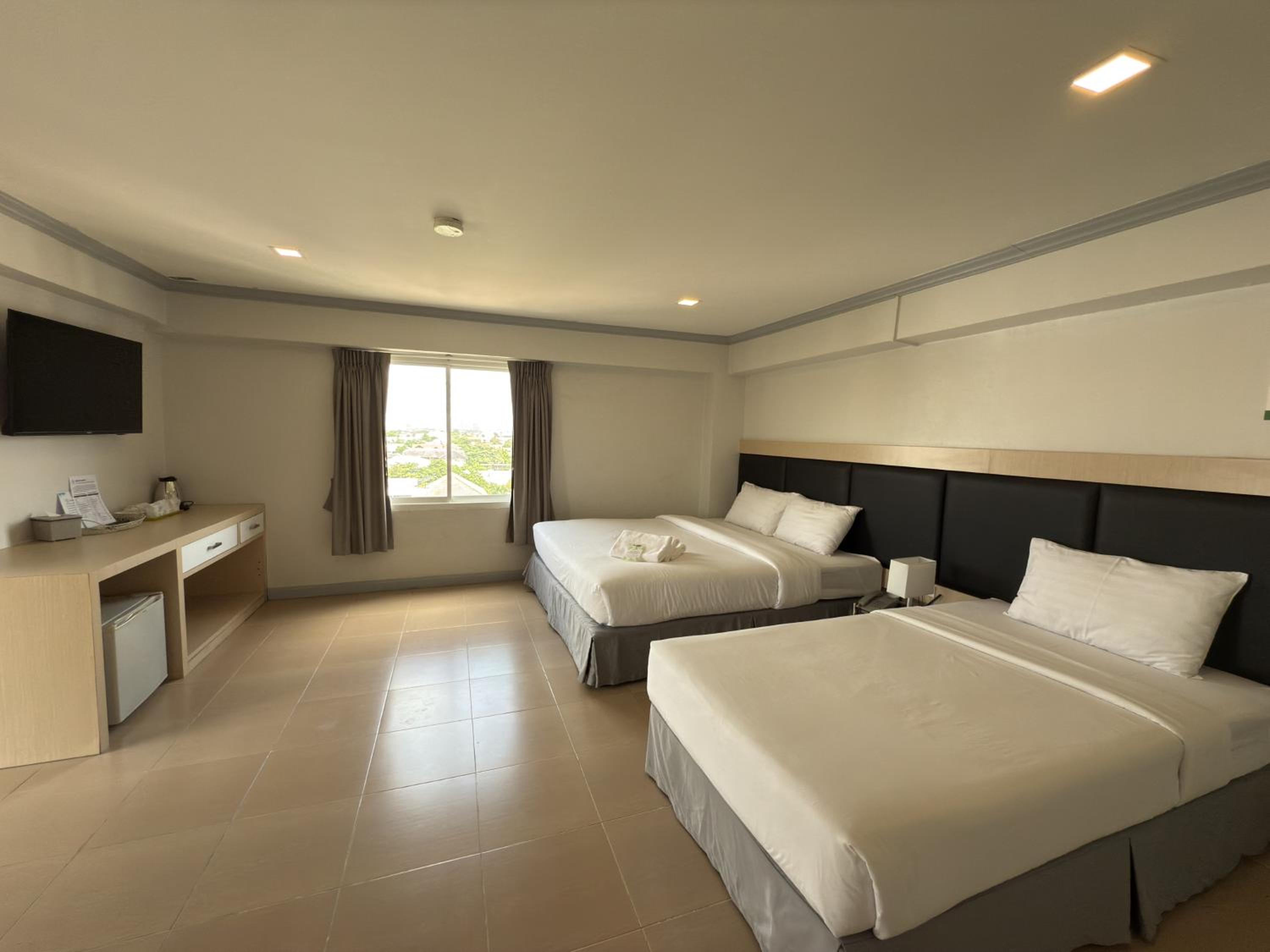 Deluxe Triple Room