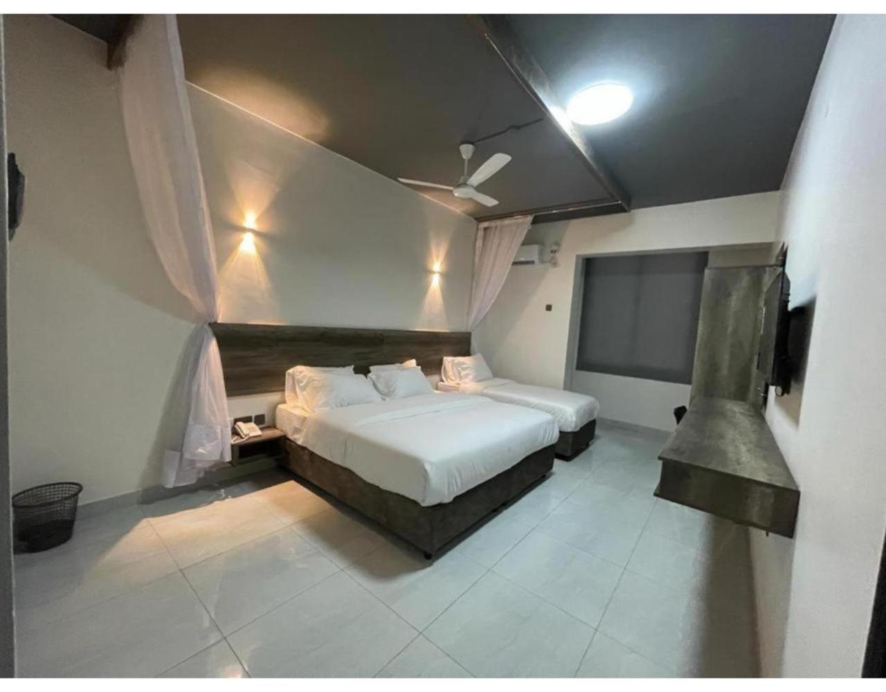 Deluxe Triple Room - Photo 7