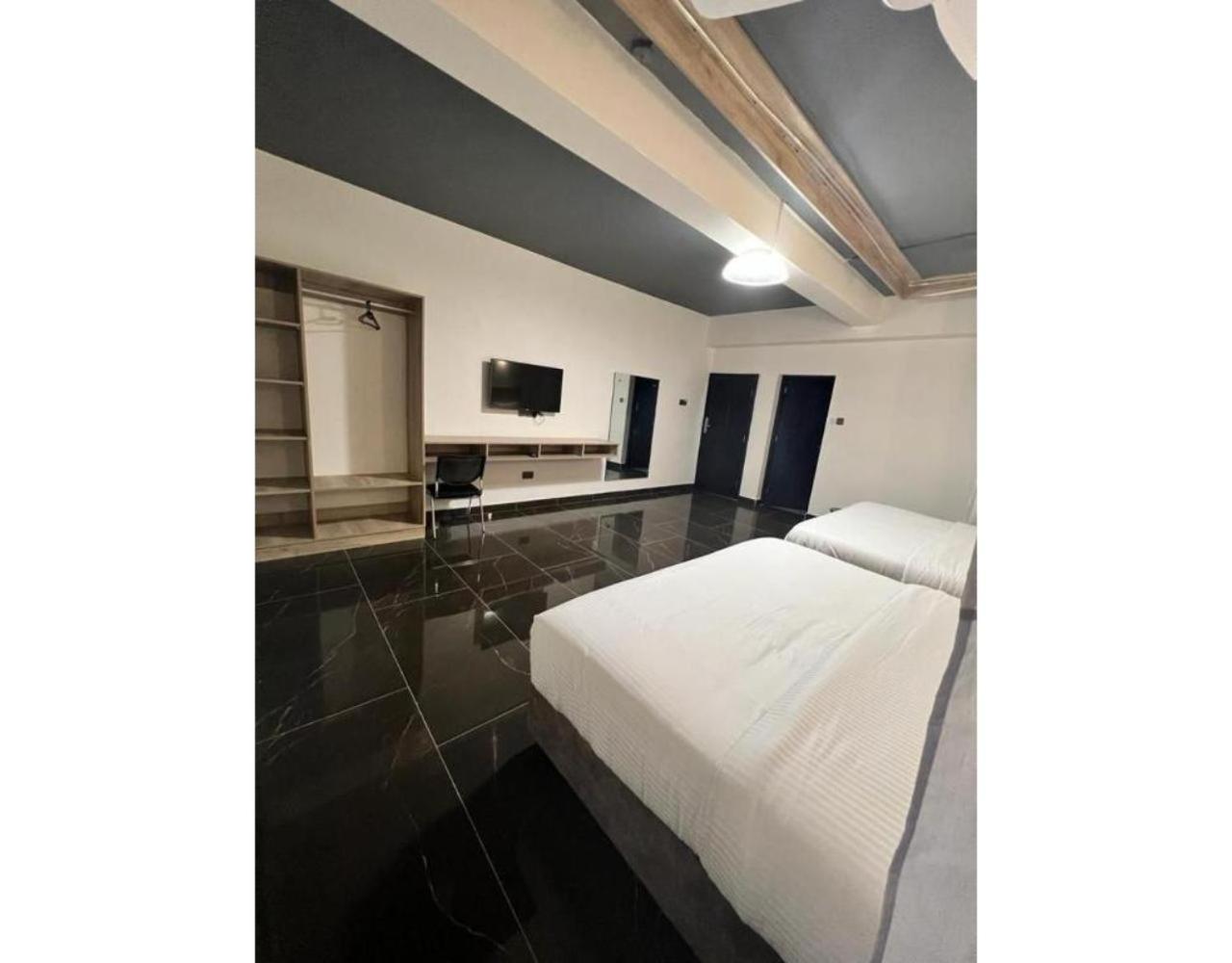 Deluxe Quadruple Room - Photo 20