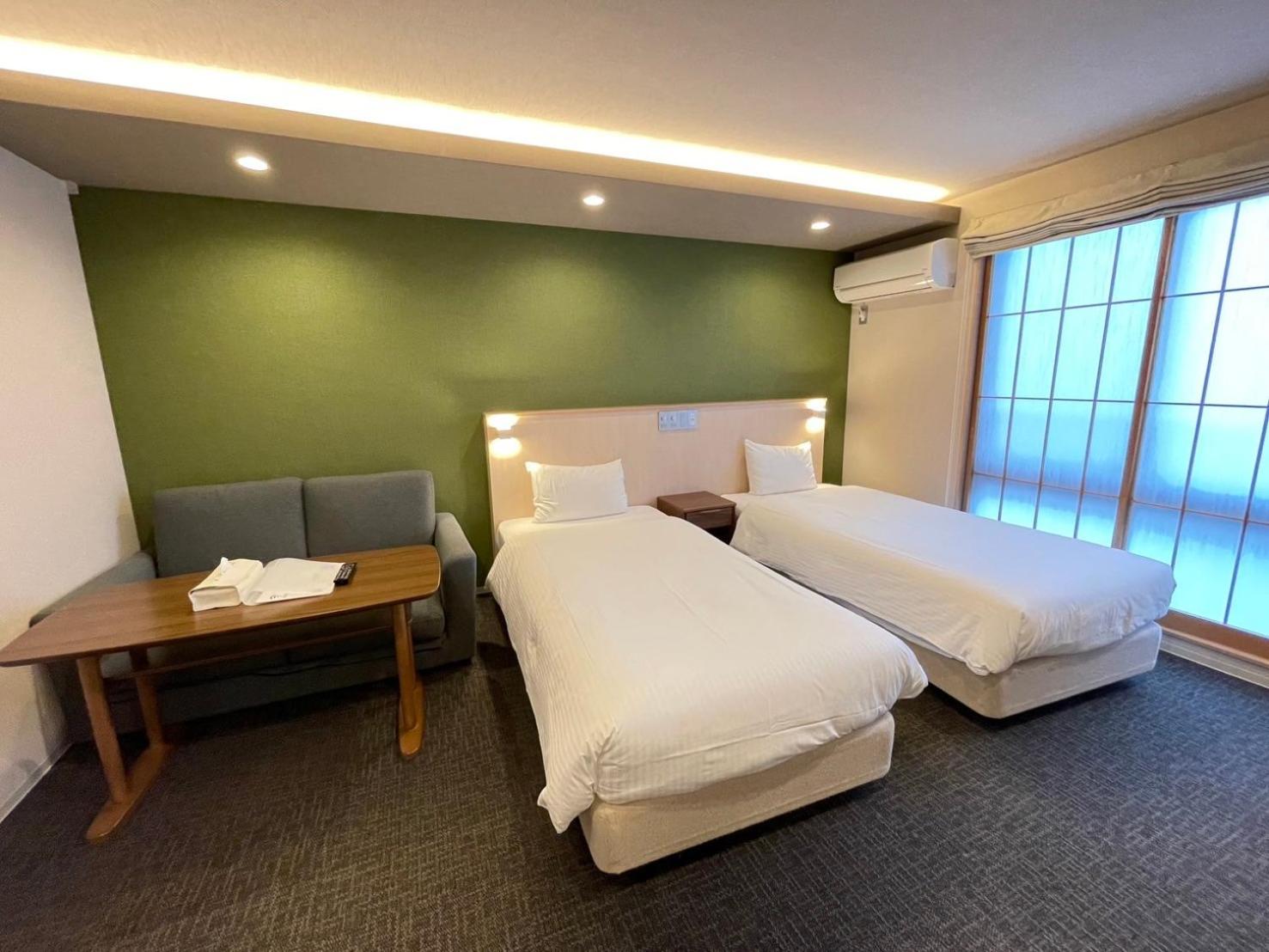 Deluxe Twin Room - Photo 9