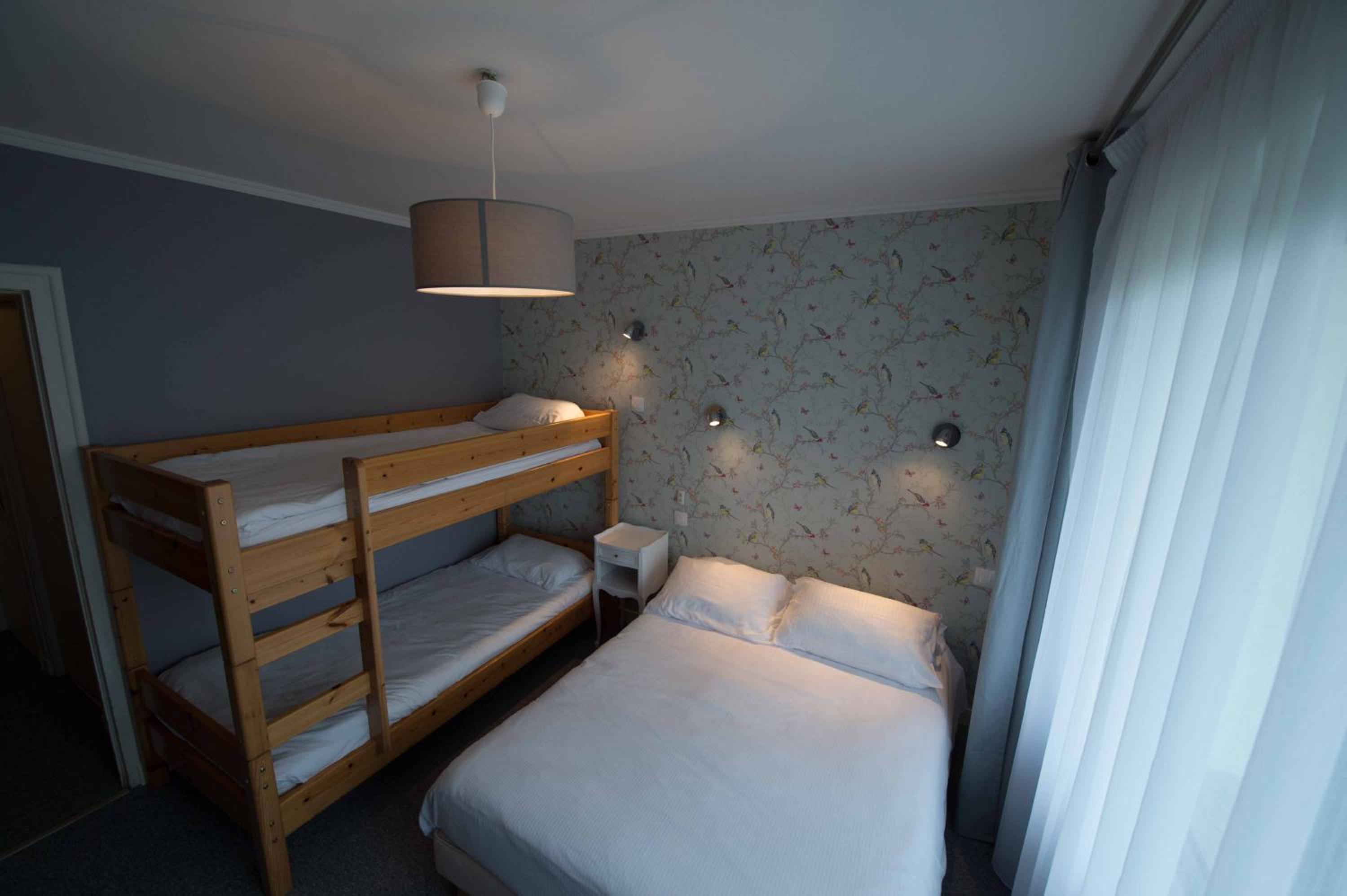 Quadruple Room (2 Adults + 2 Children) photo 2