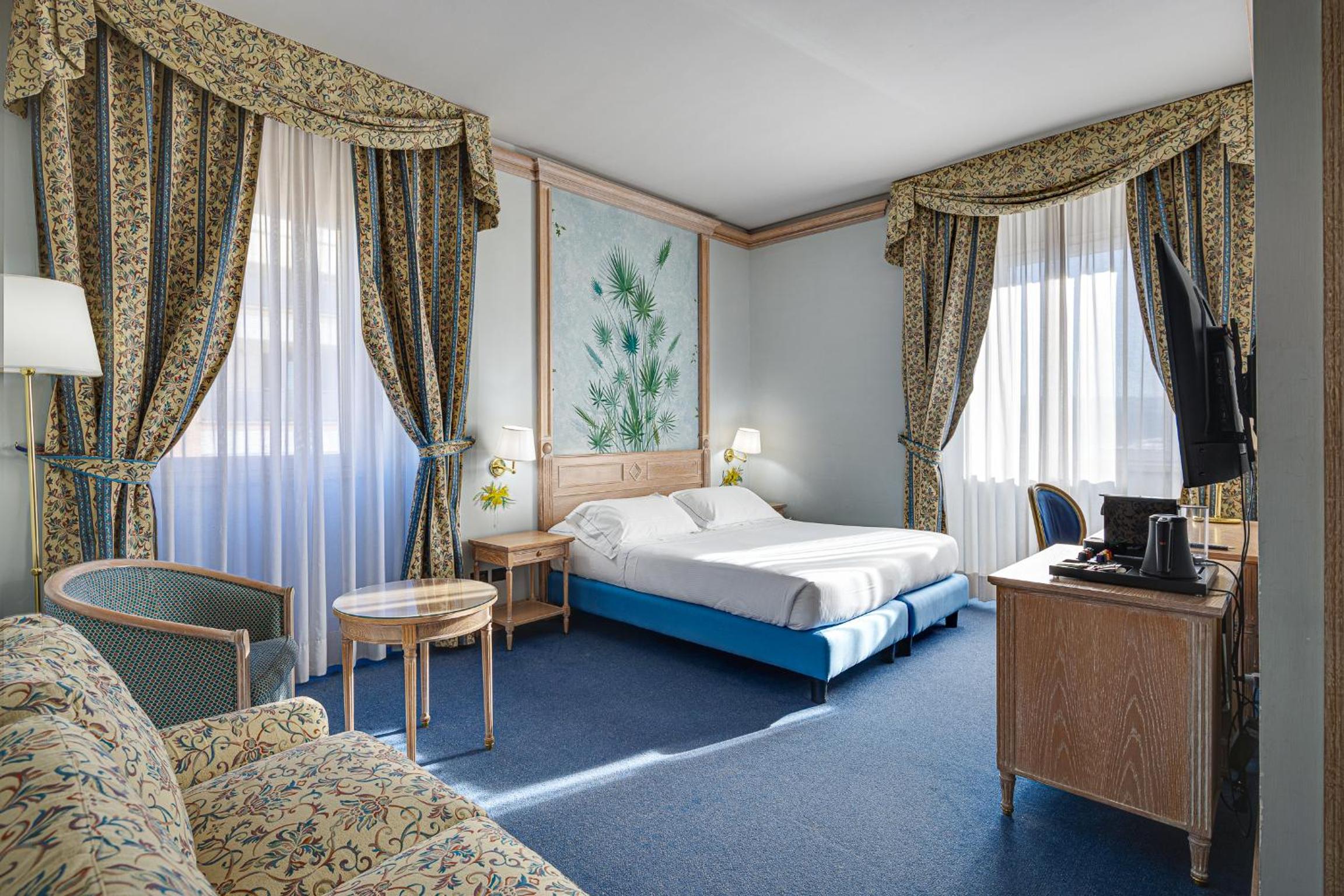 Deluxe Room - Photo 1
