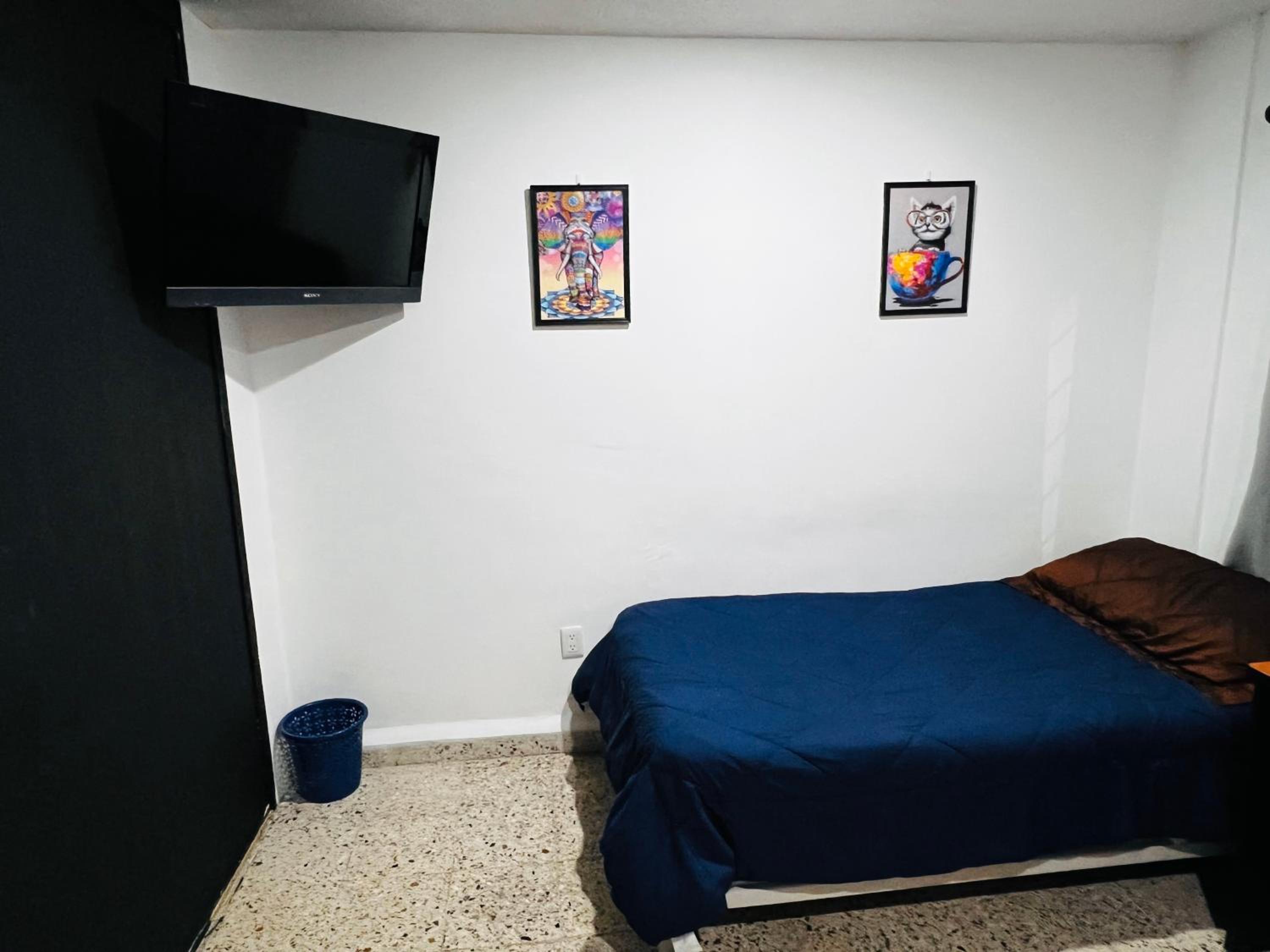 Economy Triple Room with Shared Bathroom