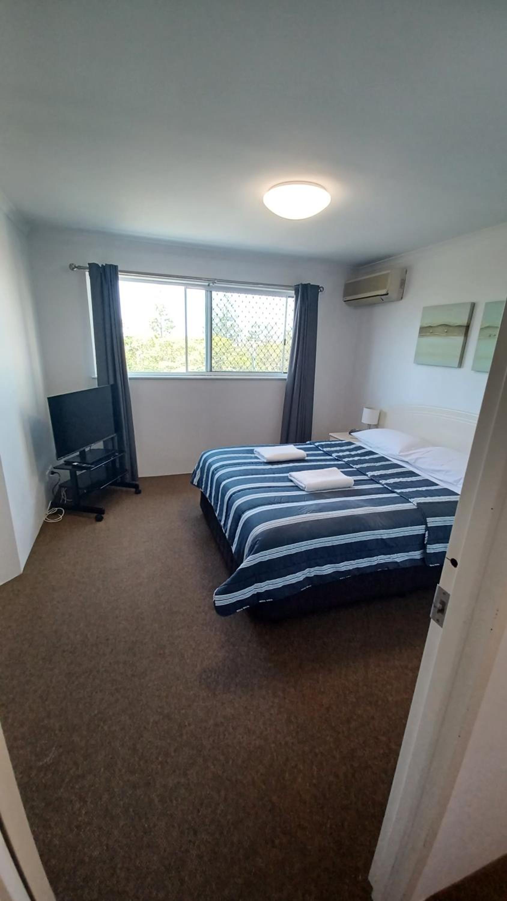 Three-Bedroom Apartment - Photo 20