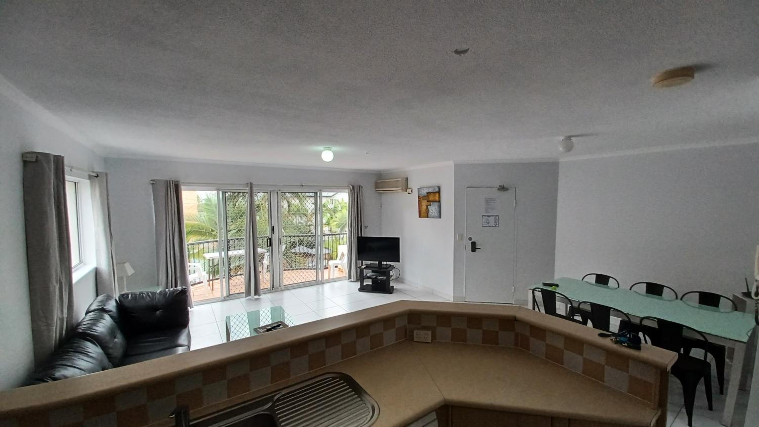 Three-Bedroom Apartment - Photo 2