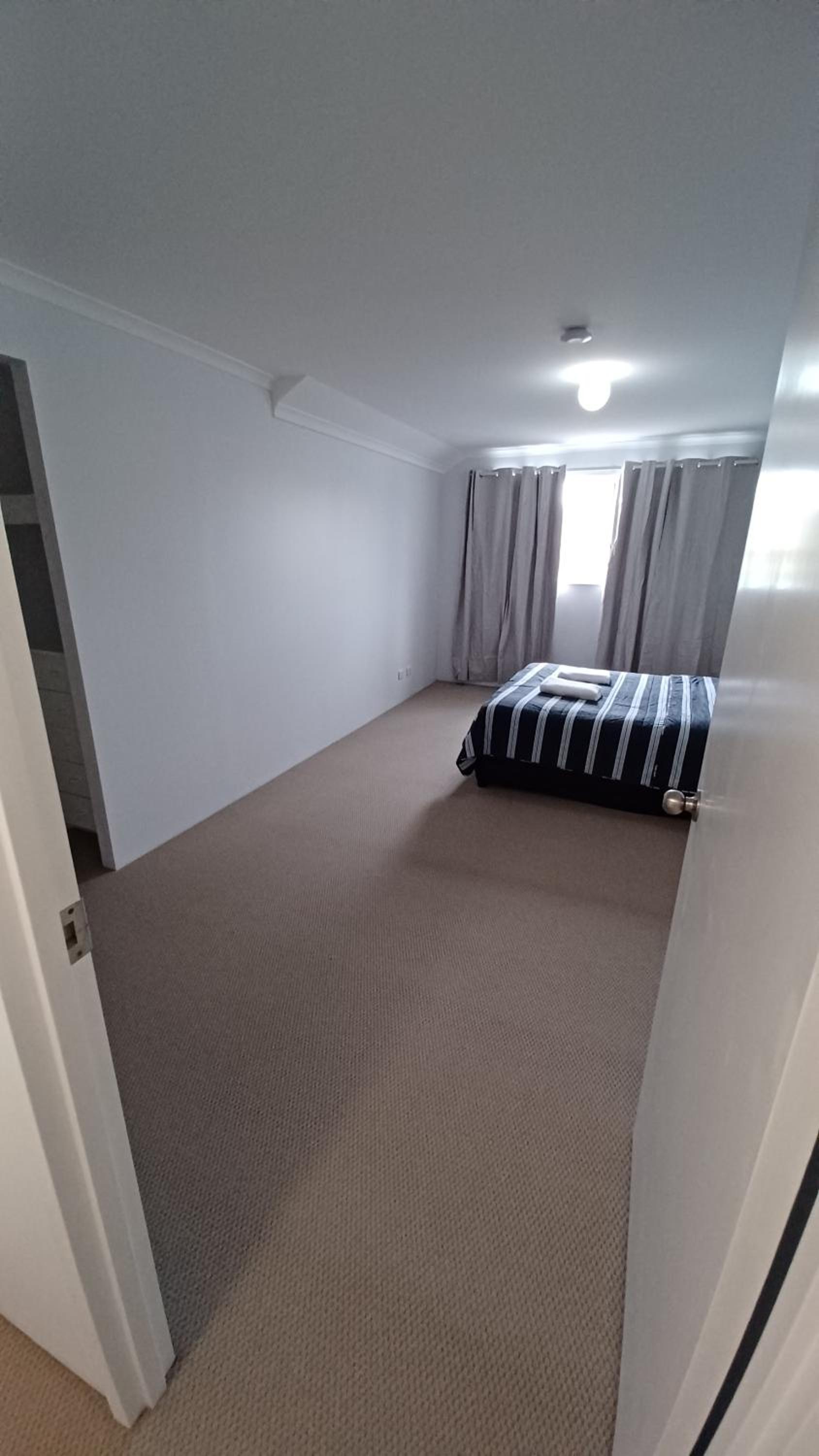 Three-Bedroom Apartment - Photo 9