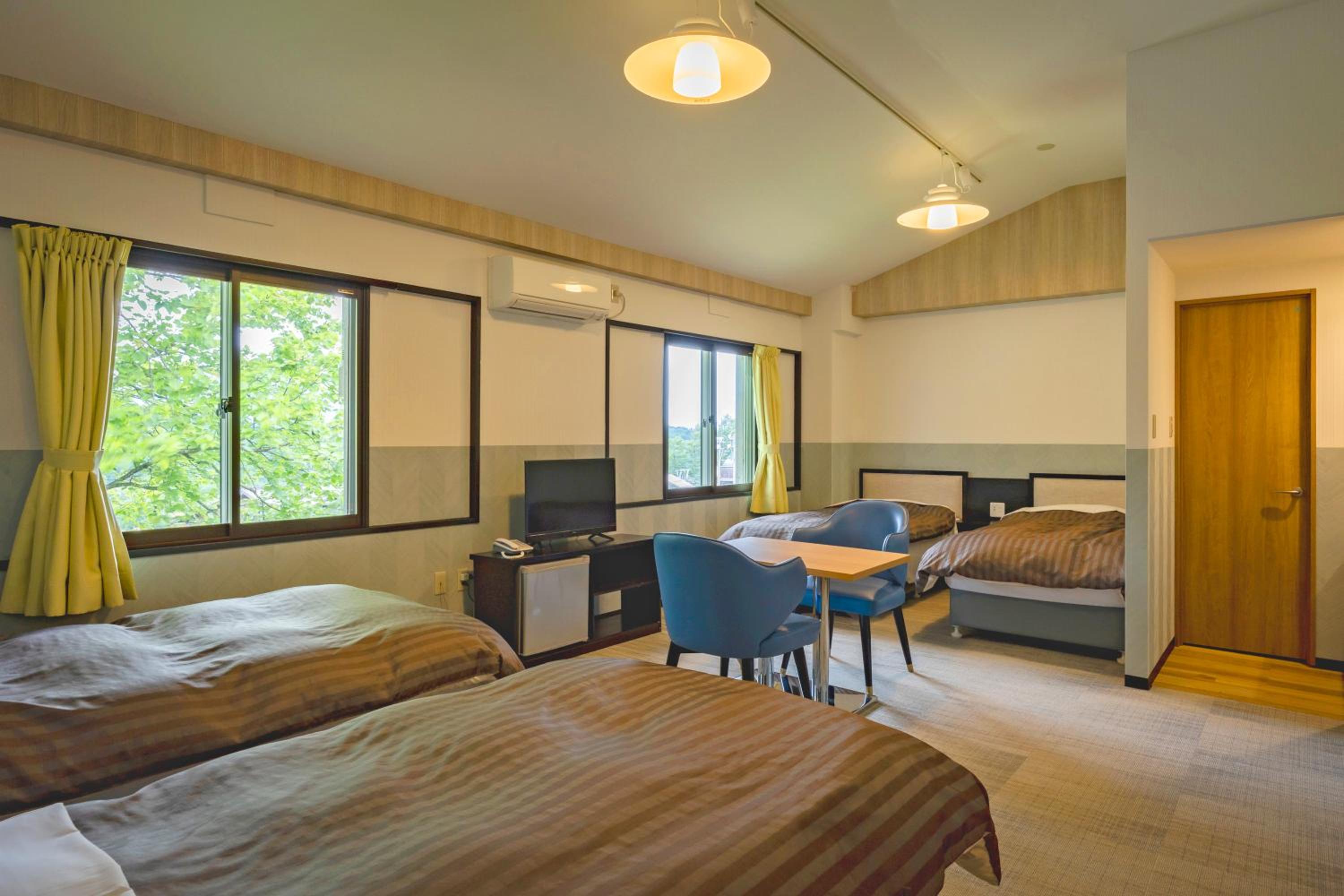 Quadruple Room with Shared Bathroom