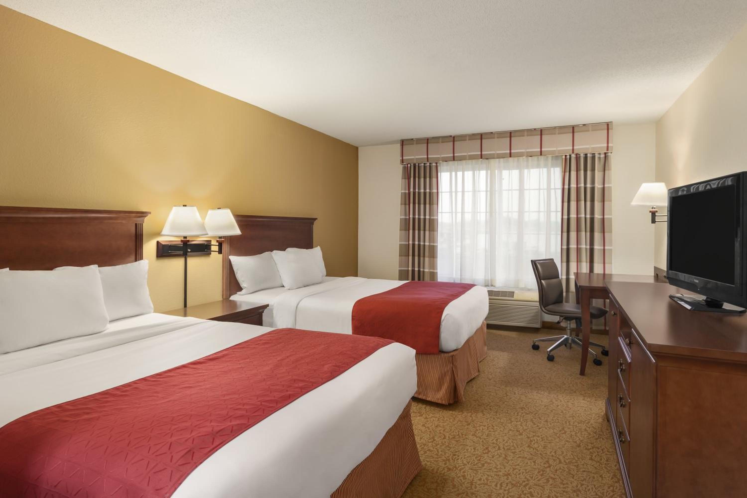 Queen Room With Two Queen Beds - Pet Friendly/Non-Smoking - Photo 1