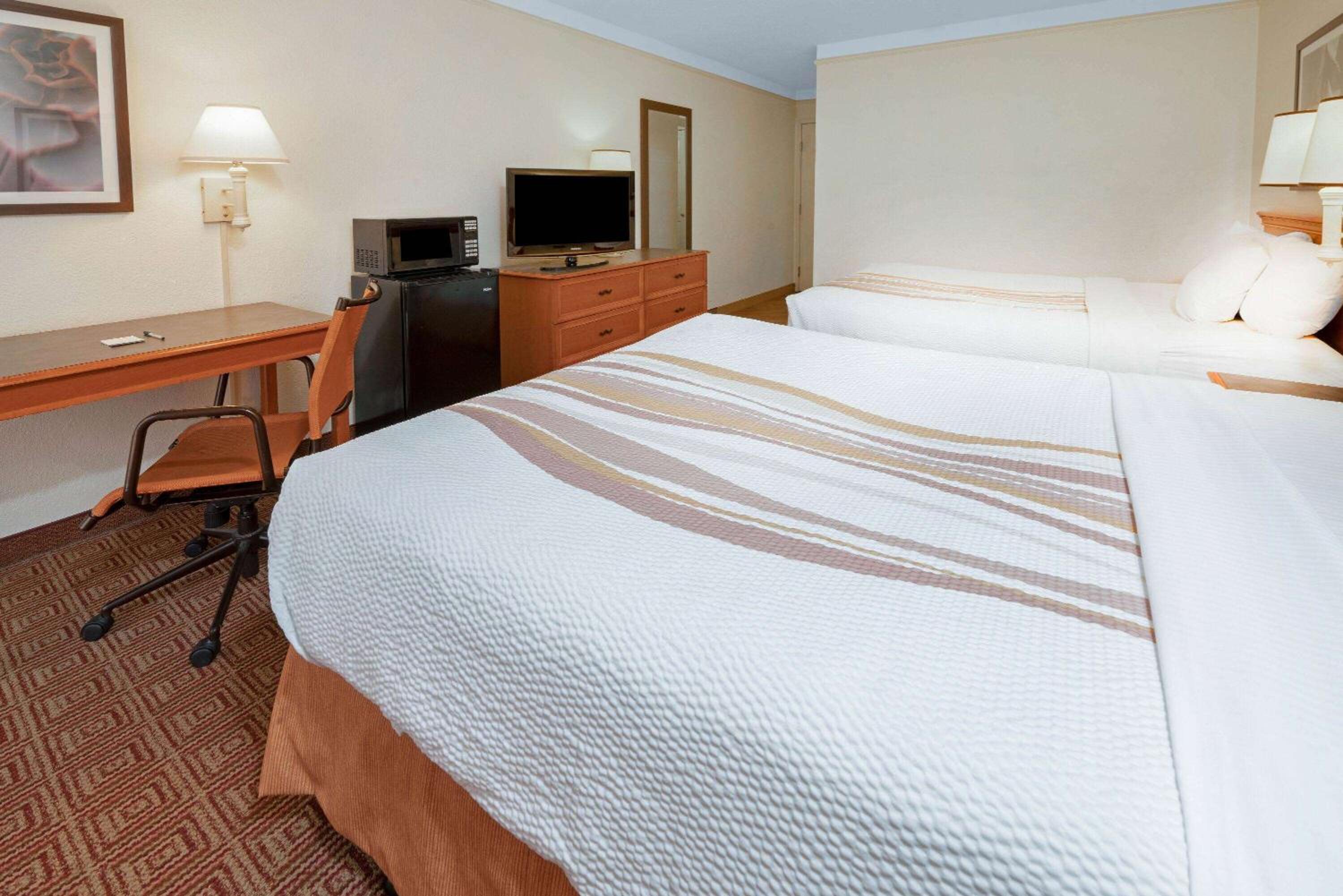 Deluxe Queen Room with Two Queen Beds - Non-Smoking photo 1