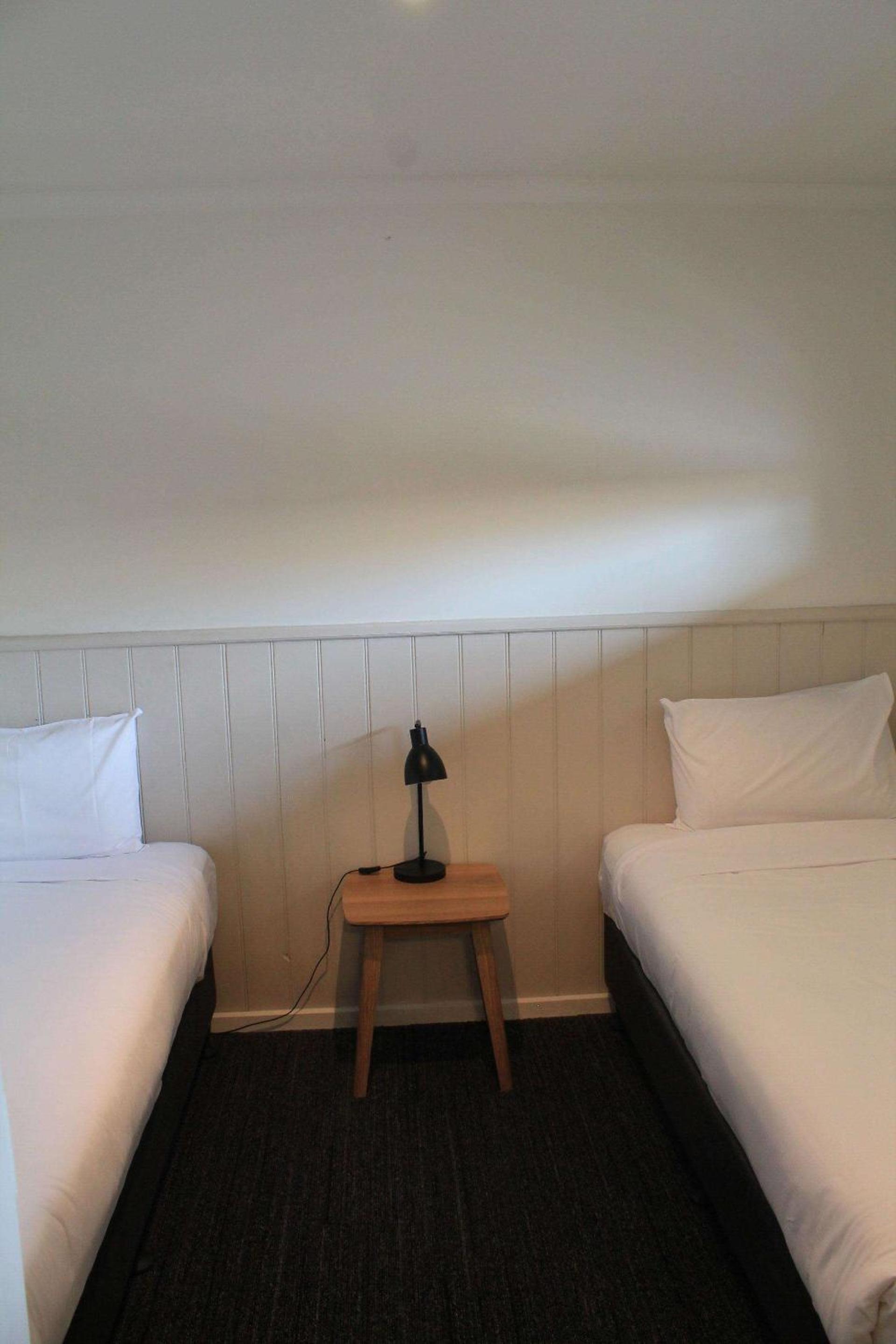 Courtyard Family Room (One King and Two Single Beds) photo 3