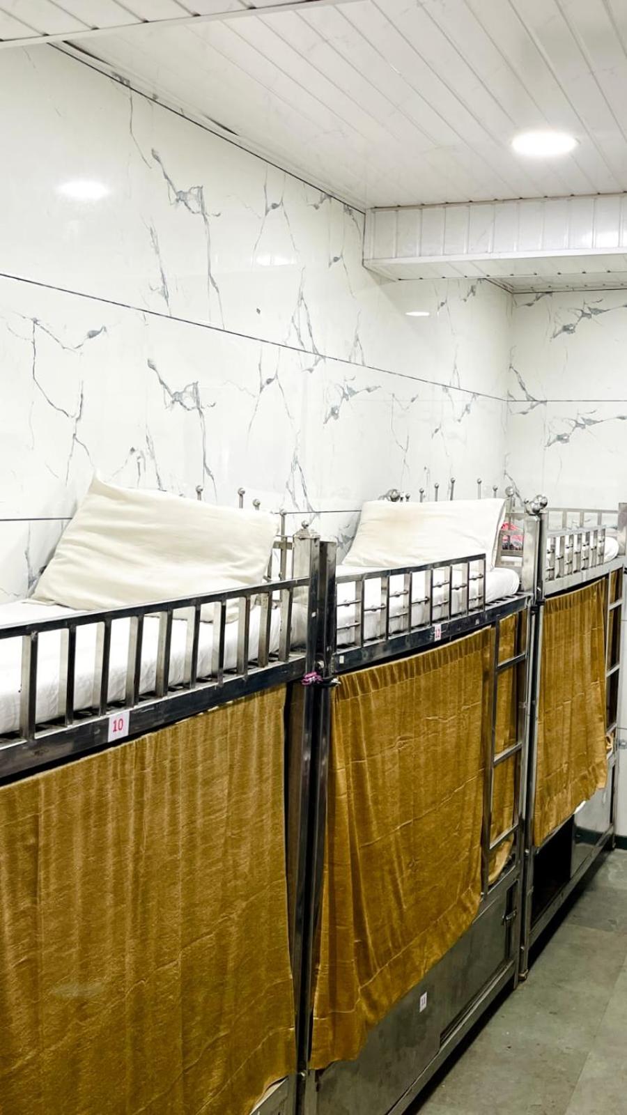 Single Bed In Male Dormitory Room